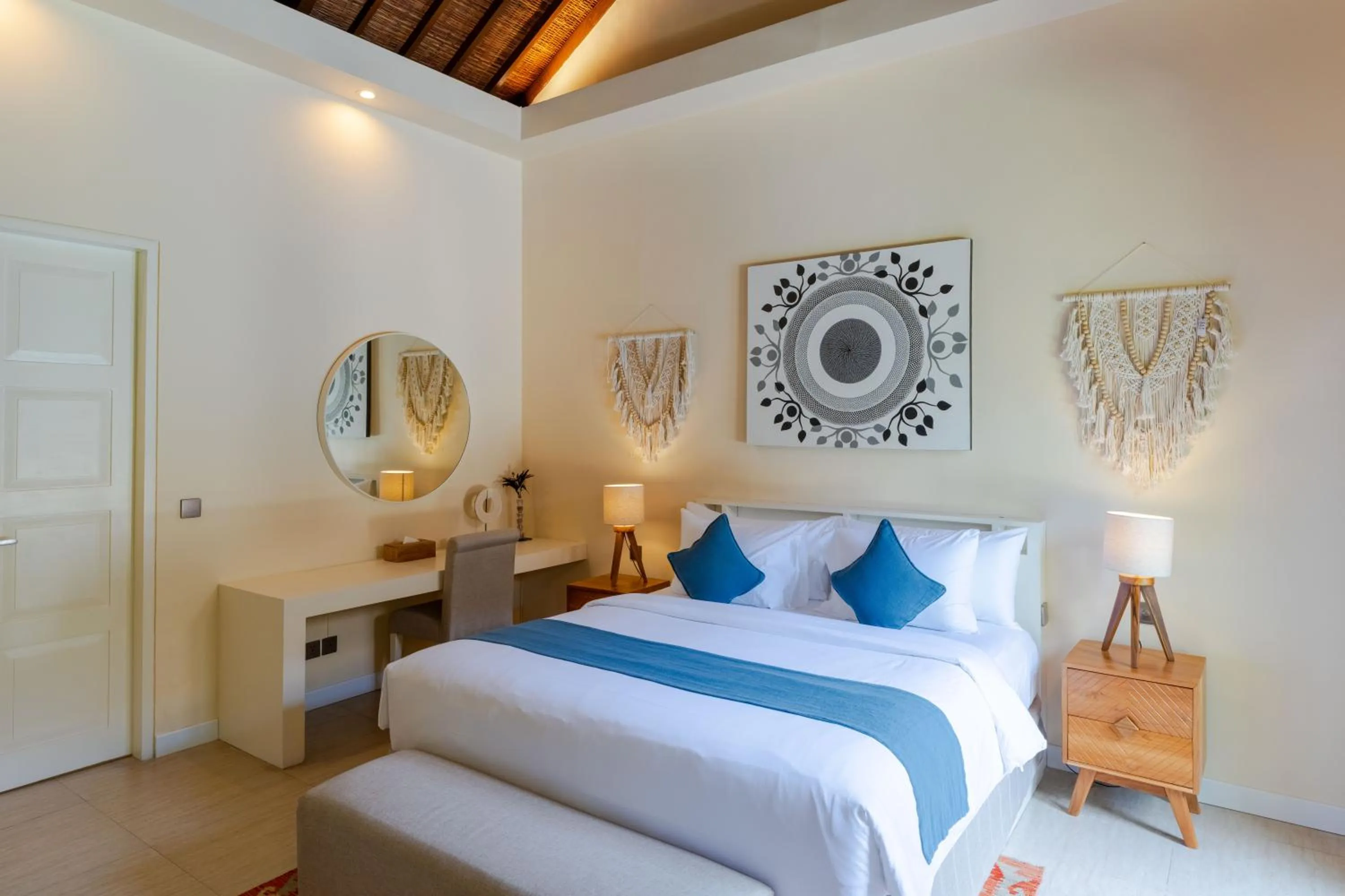 Bed in Boholuma Villas by Pertama Management