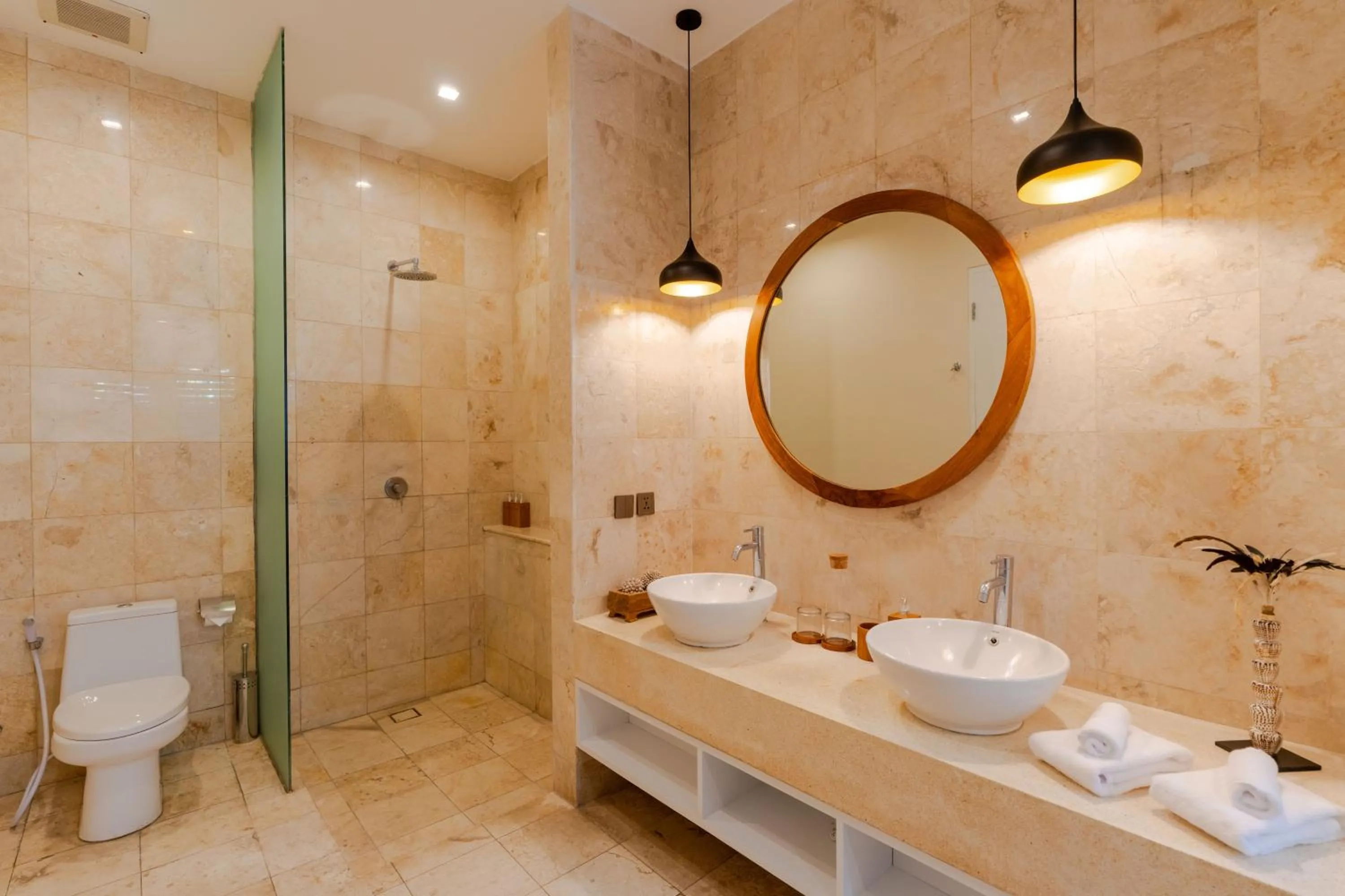 Shower in Boholuma Villas by Pertama Management