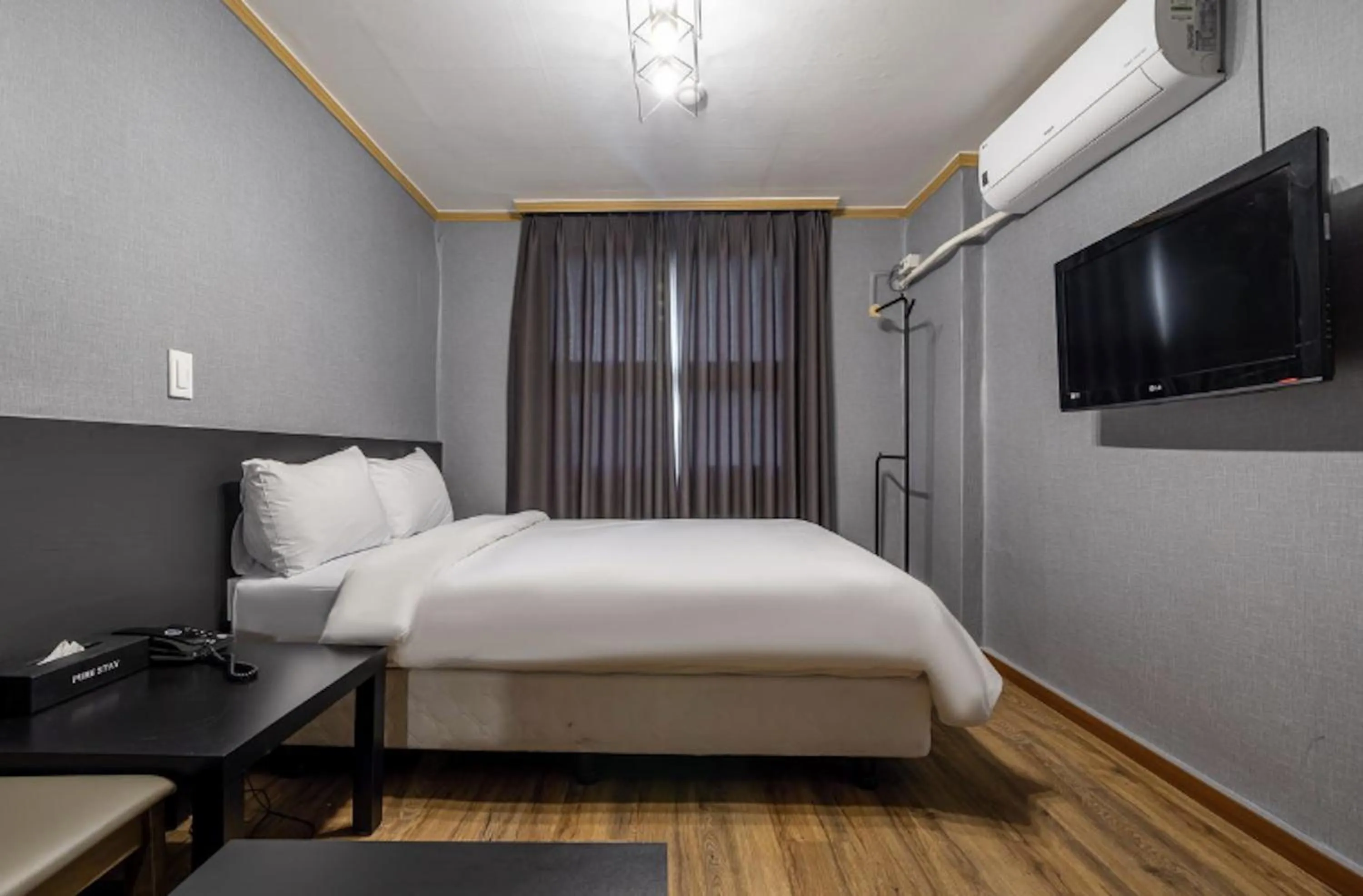 Bed in Pure Stay Jeju City