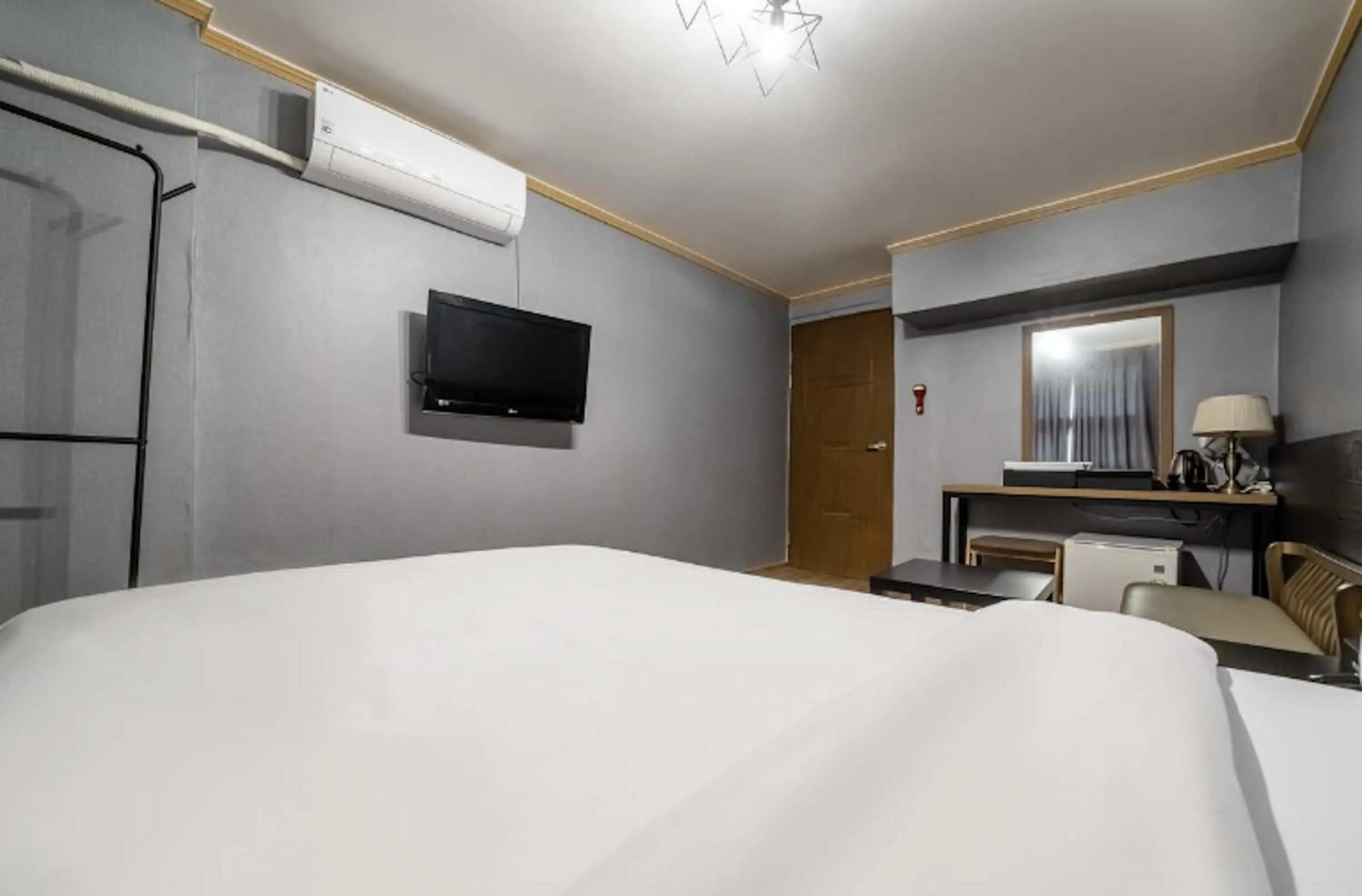 Bed in Pure Stay Jeju City