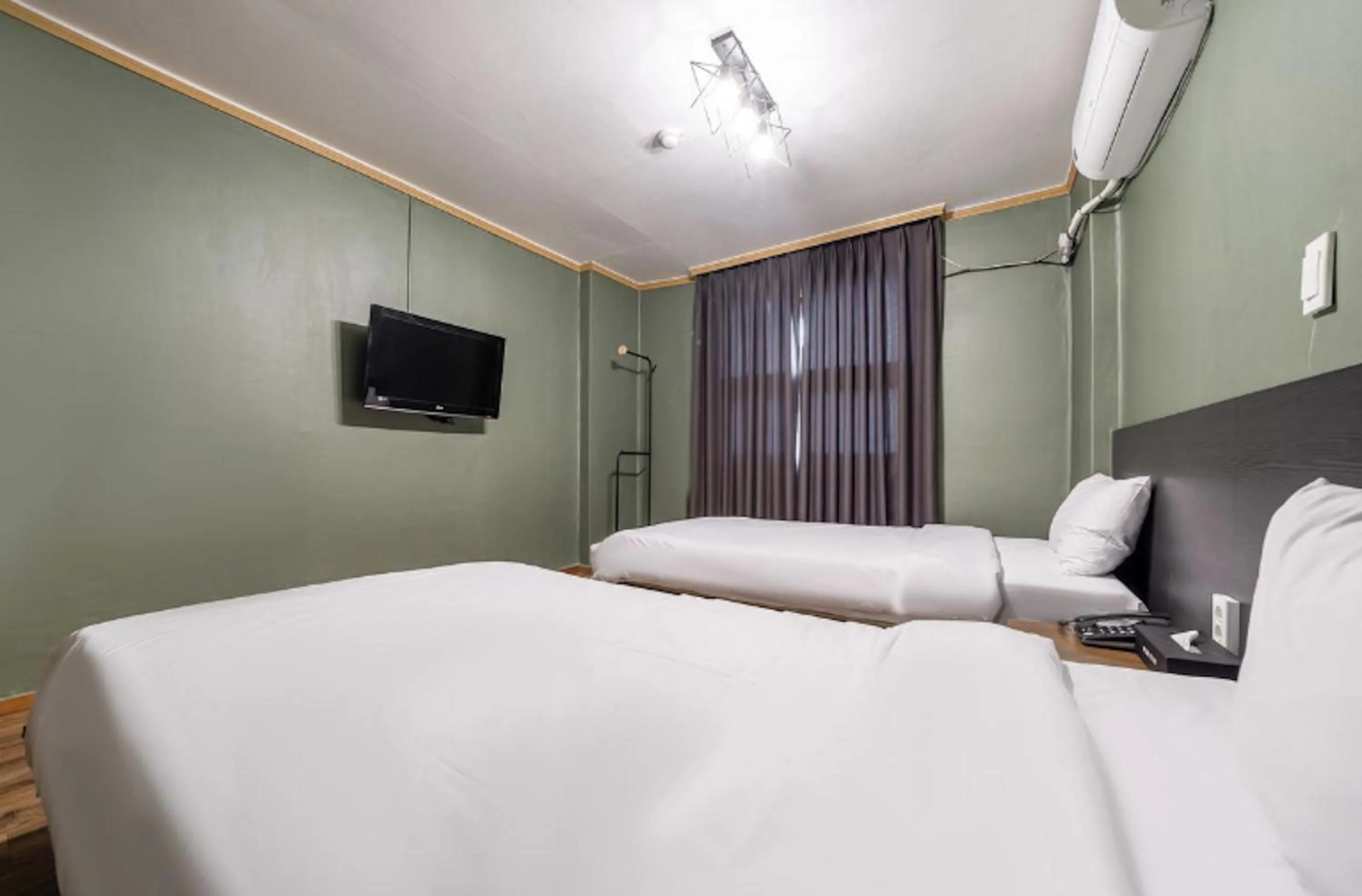 Bed in Pure Stay Jeju City