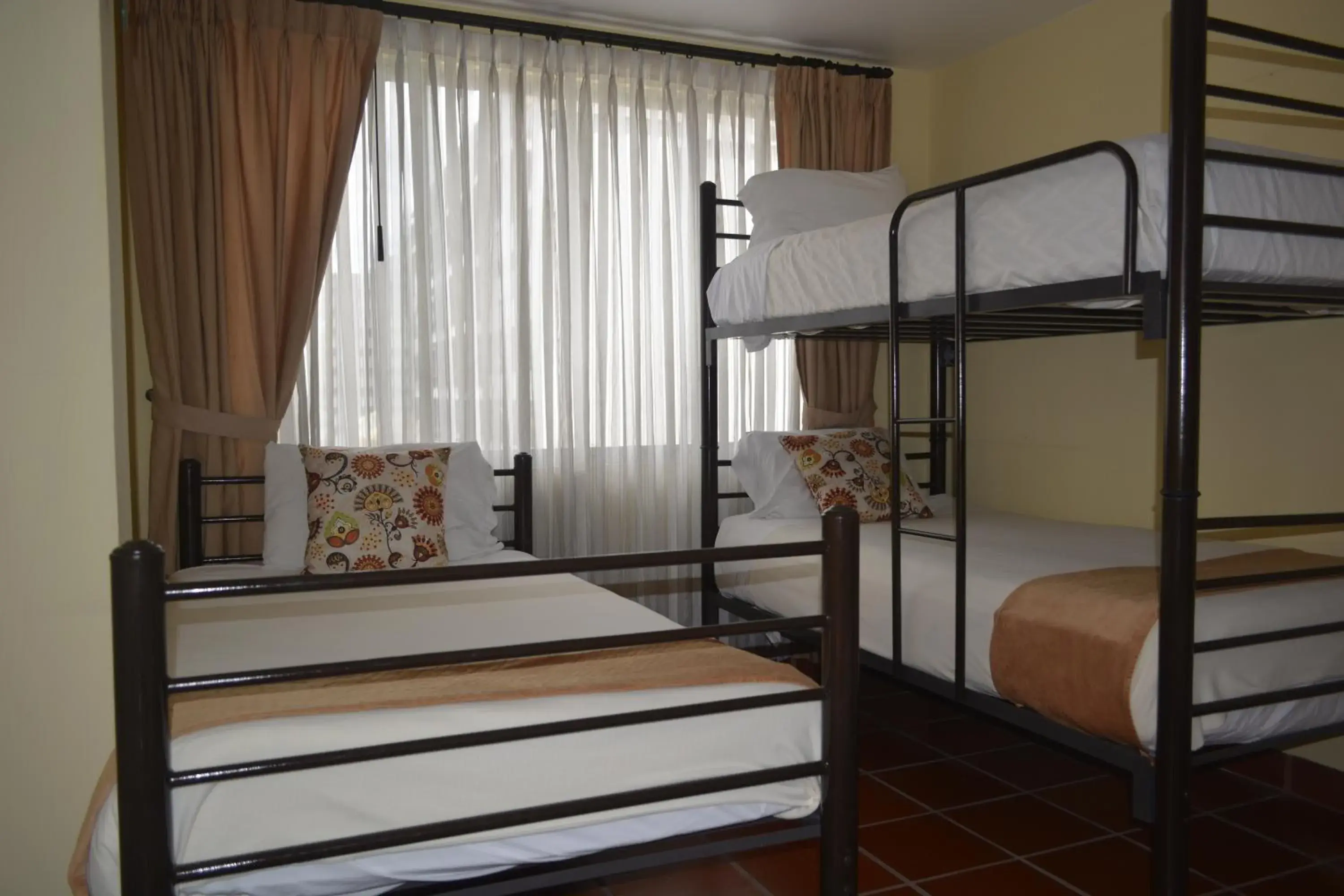 Standard Triple Room in Hotel Casa Kolping Quito Standard Triple Room in Hotel Casa Kolping Quito