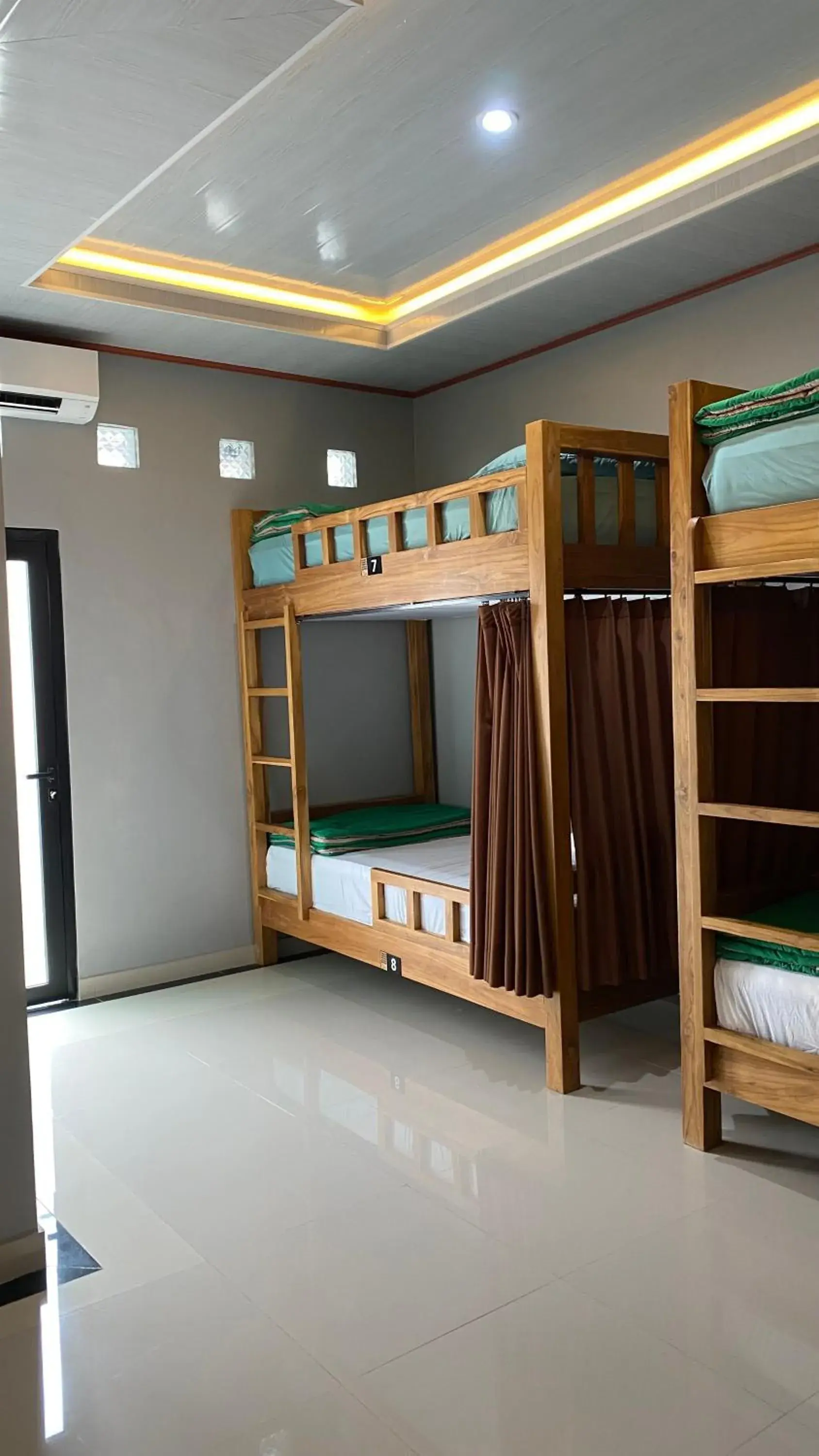 Bunk Bed in Mixed Dormitory Room in The Tis Guesthouse and Hostel Bunk Bed in Mixed Dormitory Room in The Tis Guesthouse and Hostel
