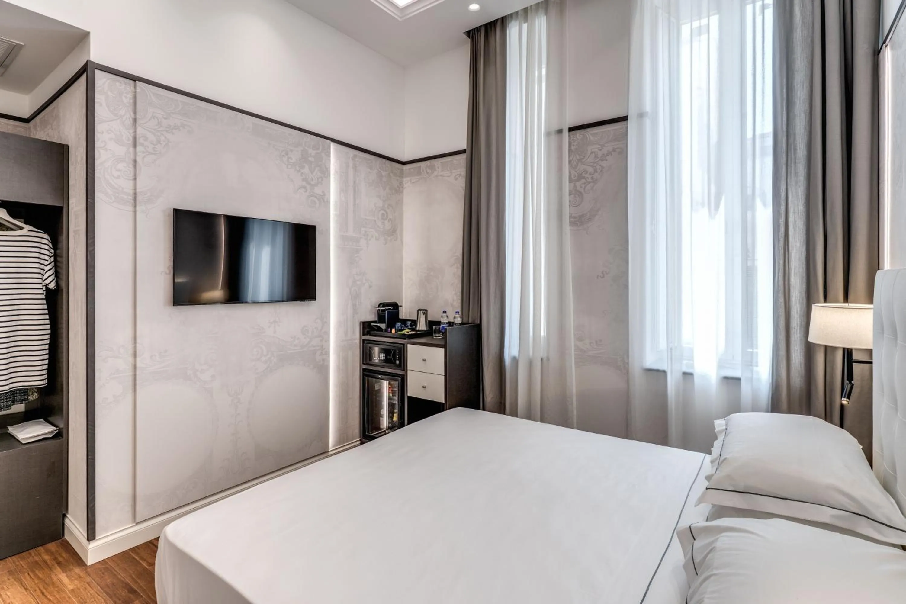 Bed in The Spotlight Boutique Hotel