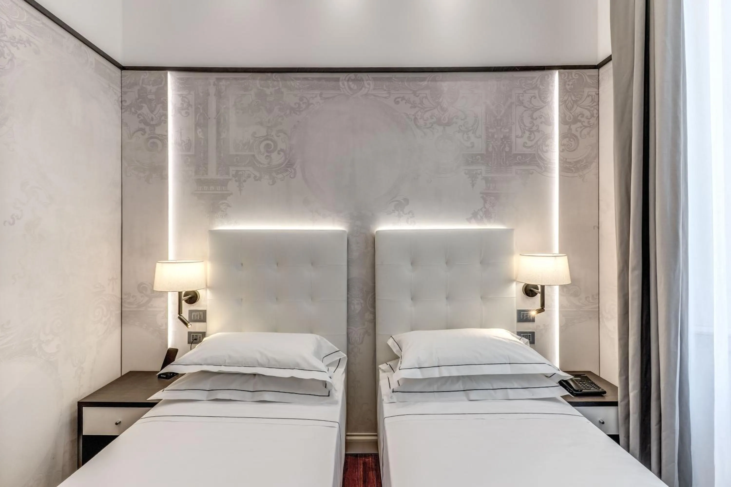 Bed in The Spotlight Boutique Hotel