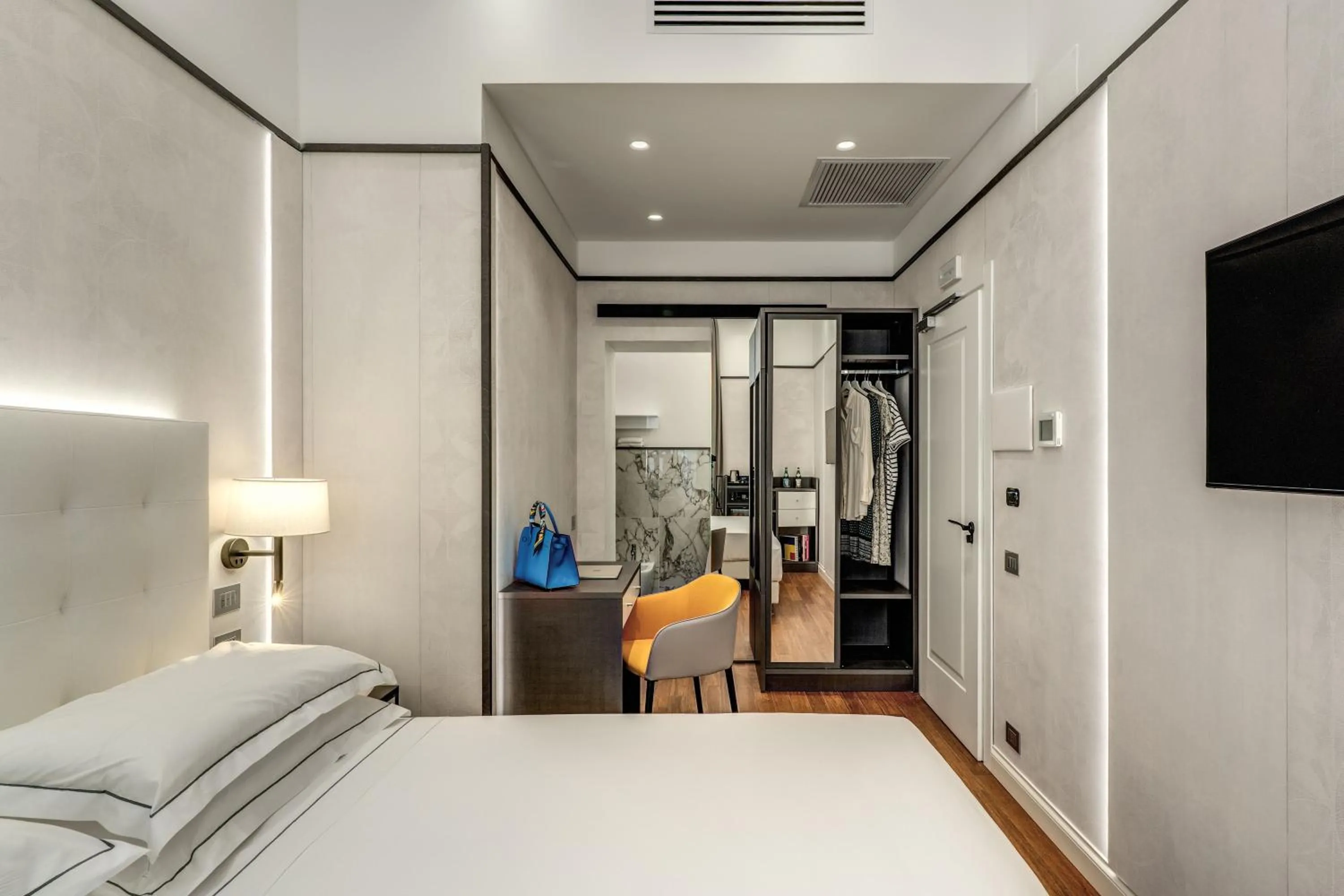 Bed in The Spotlight Boutique Hotel