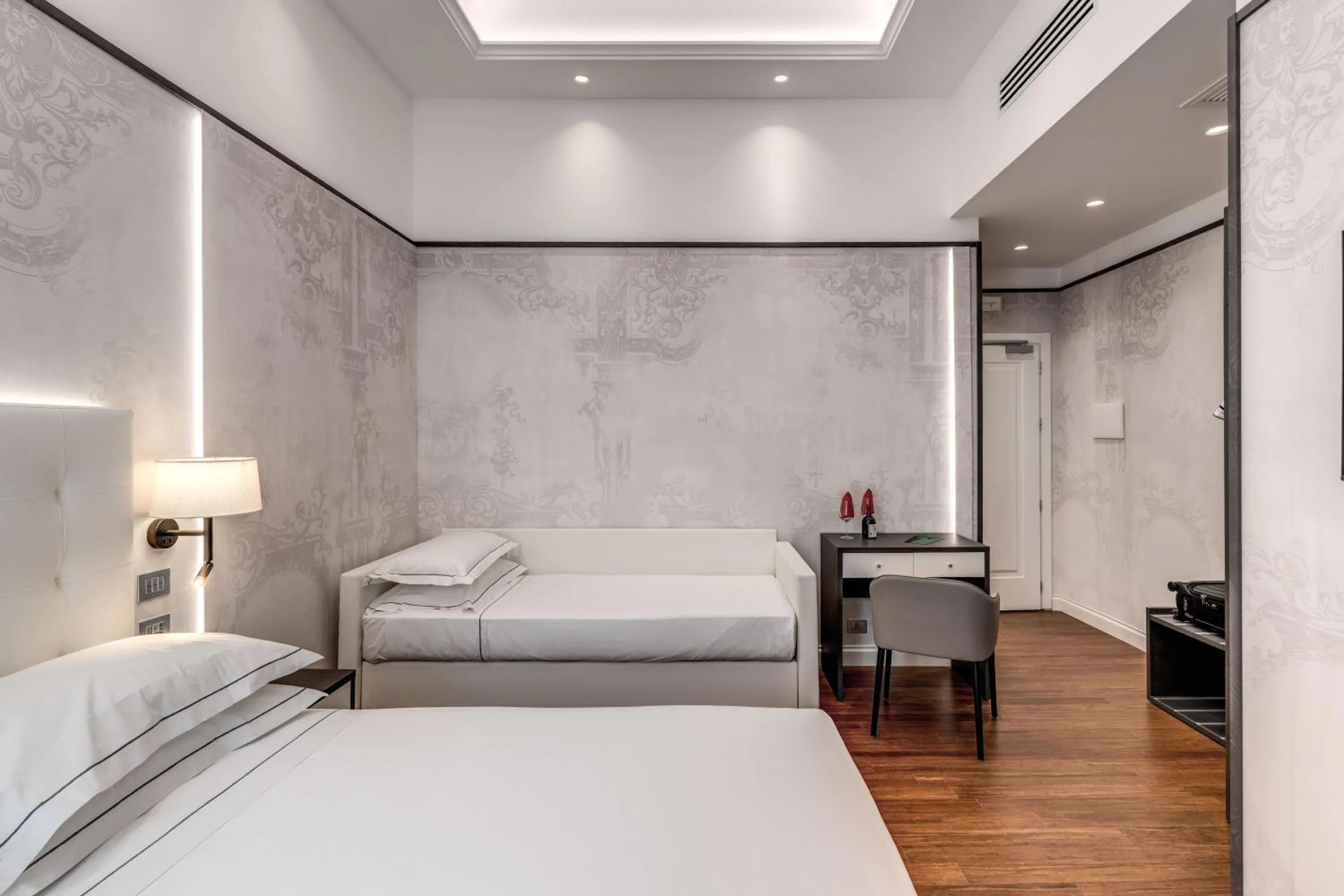 Bed in The Spotlight Boutique Hotel