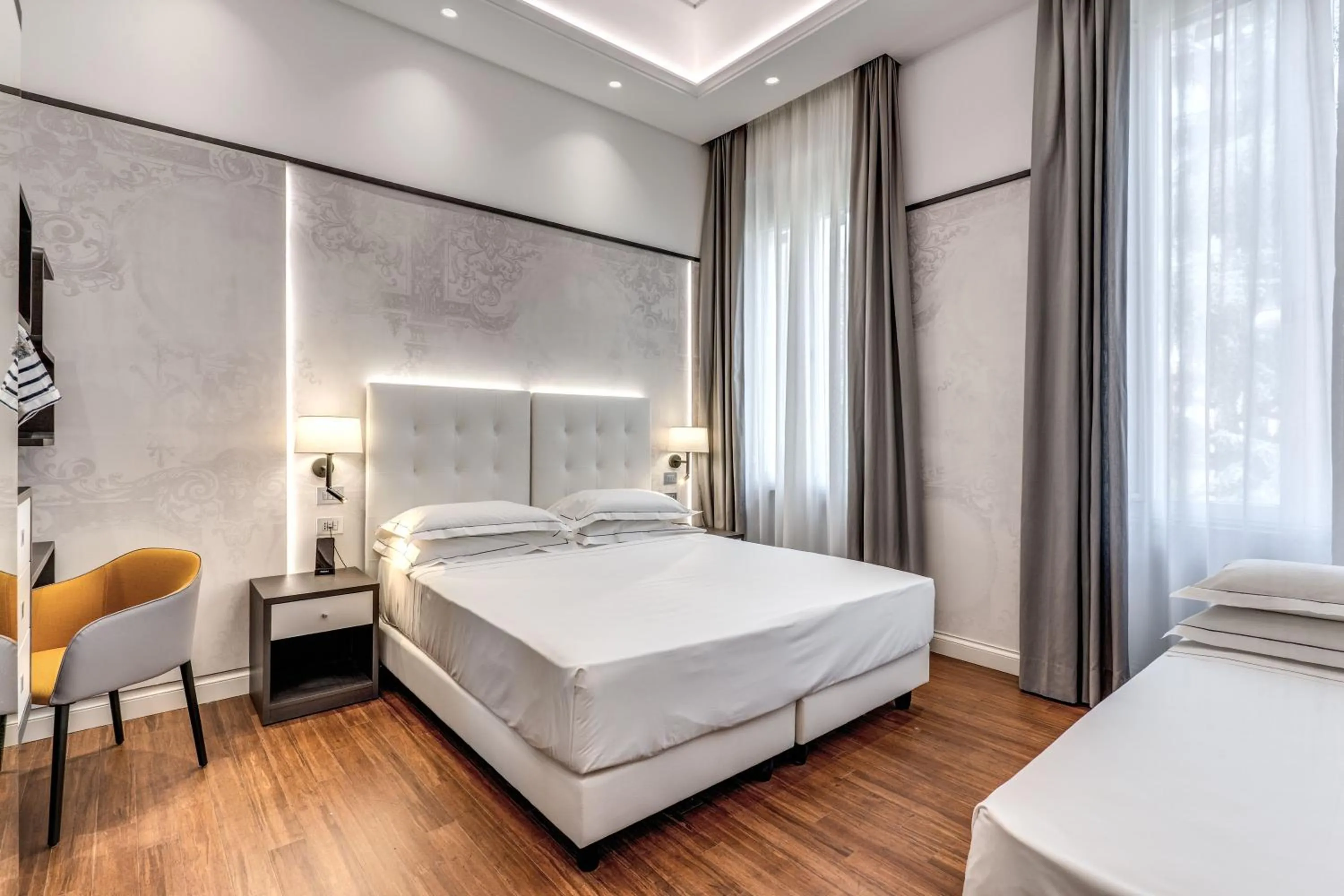 Bed in The Spotlight Boutique Hotel