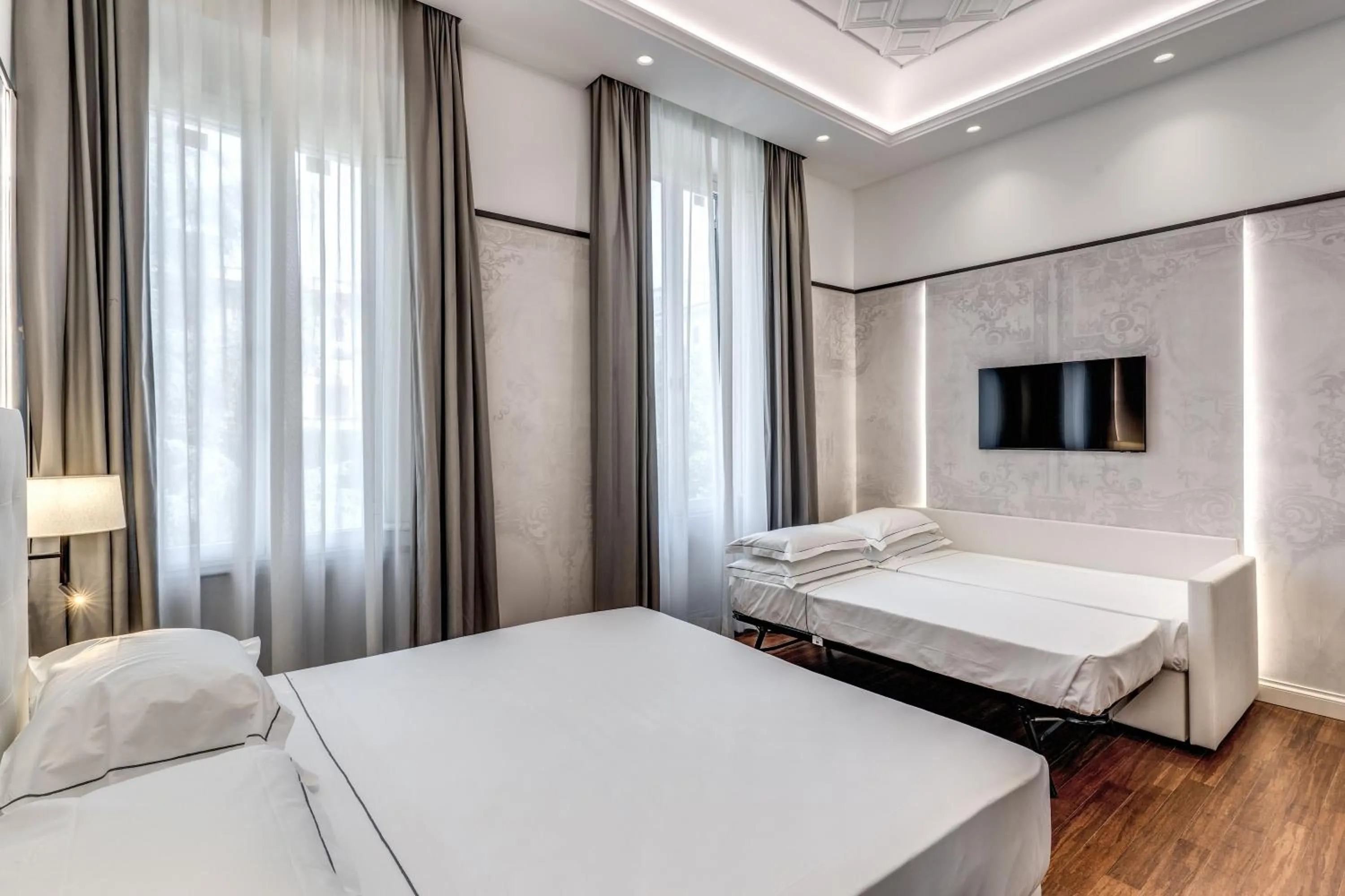 Bed in The Spotlight Boutique Hotel