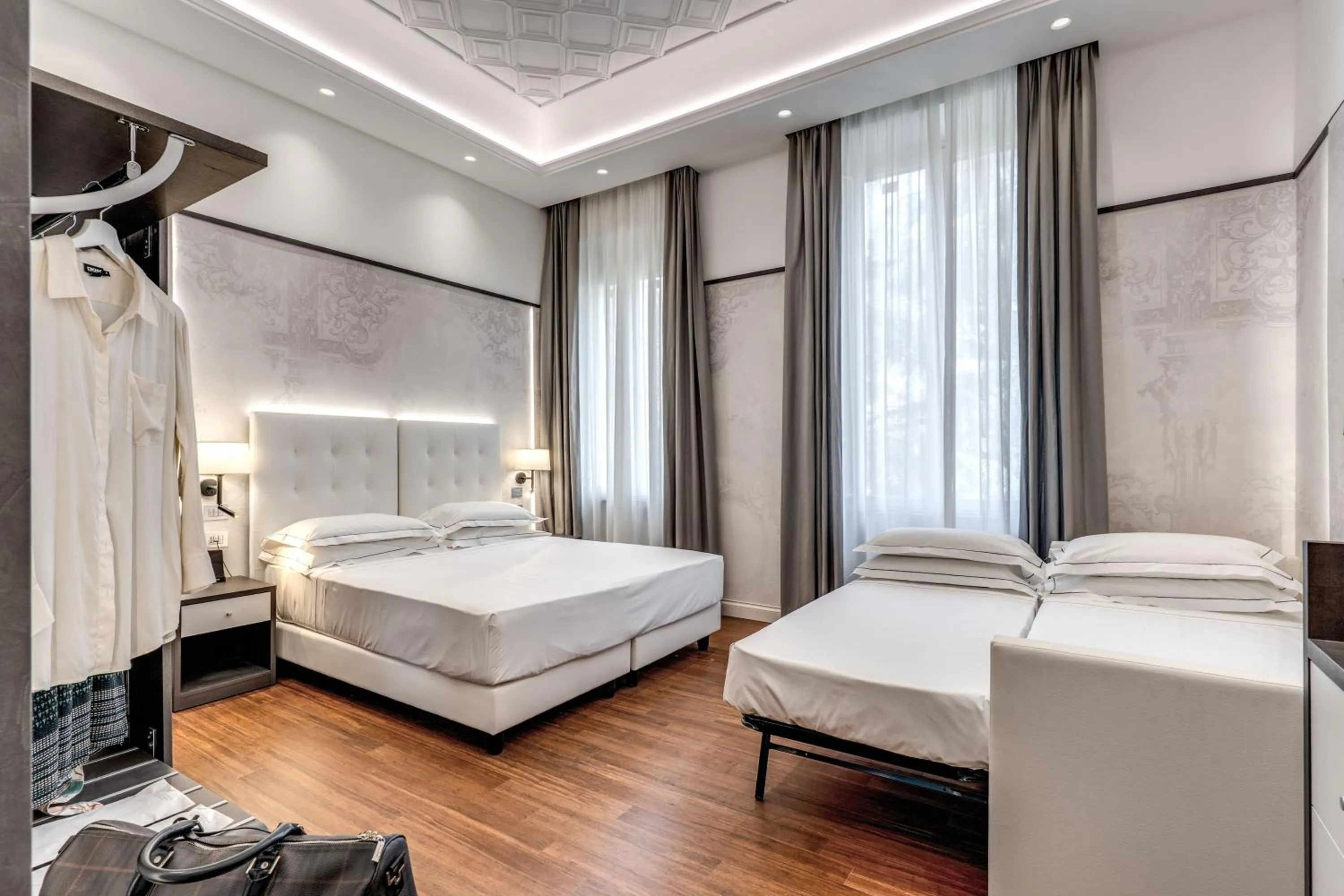 Bed in The Spotlight Boutique Hotel