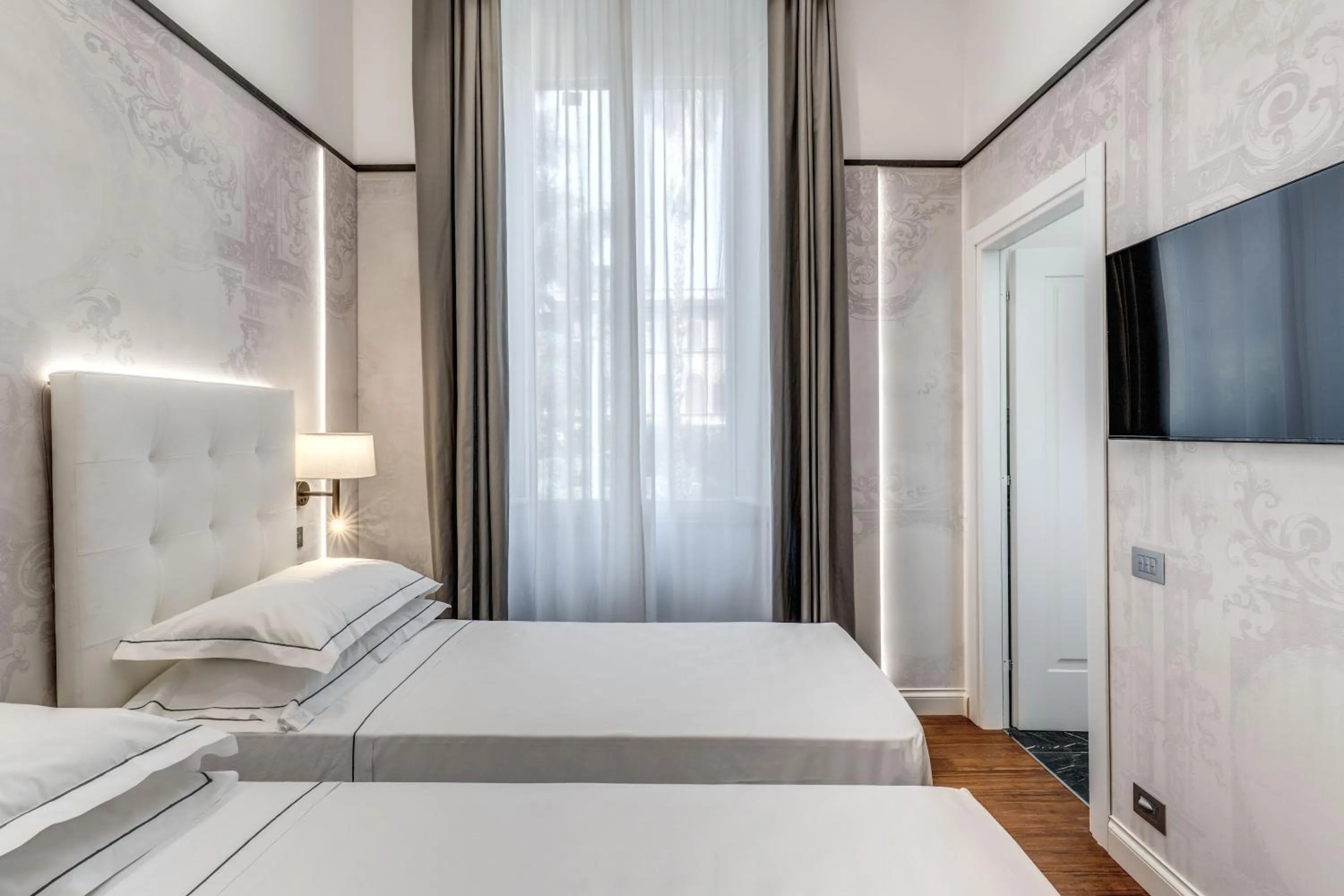 Bed in The Spotlight Boutique Hotel