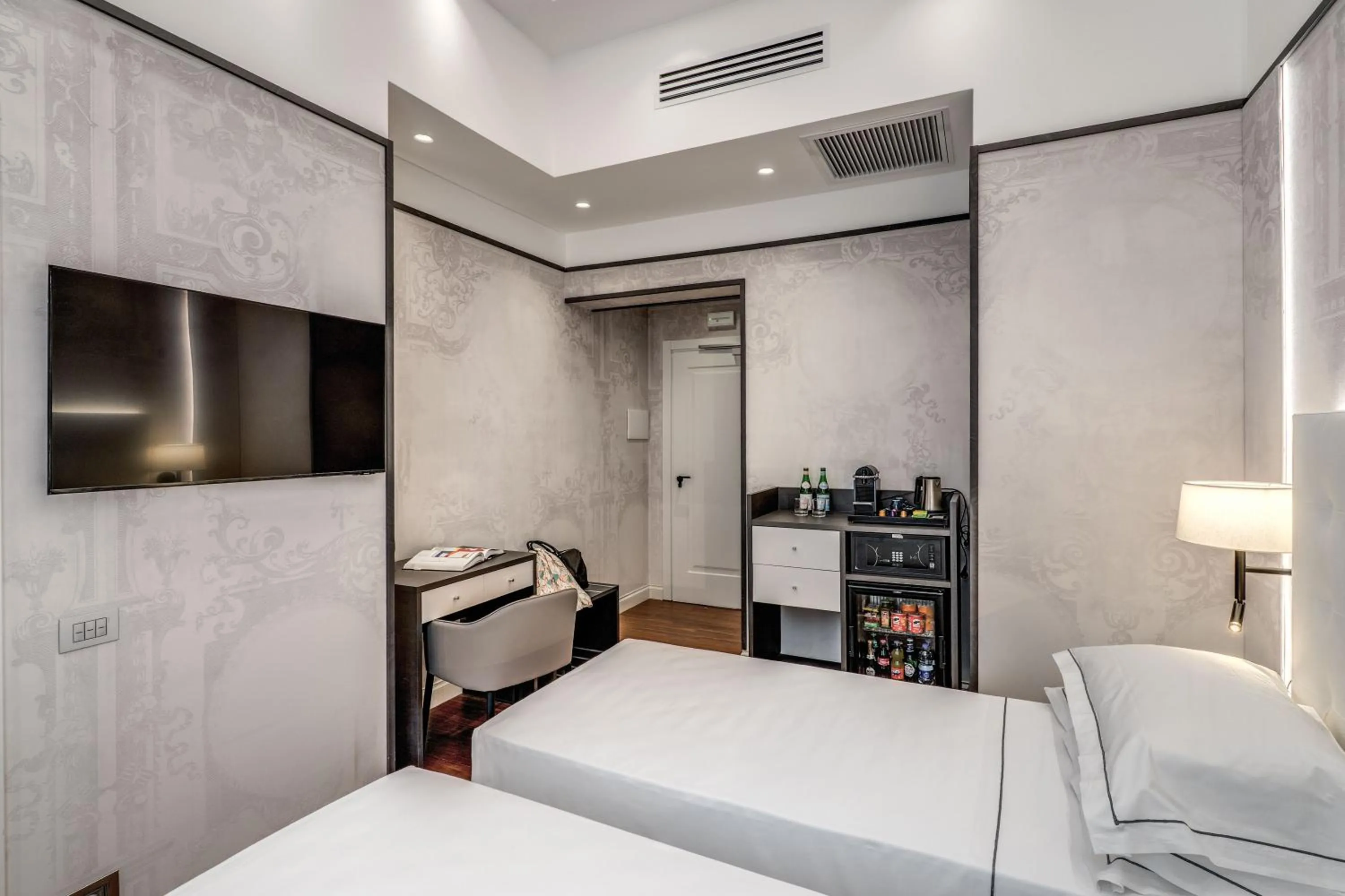 Bed in The Spotlight Boutique Hotel