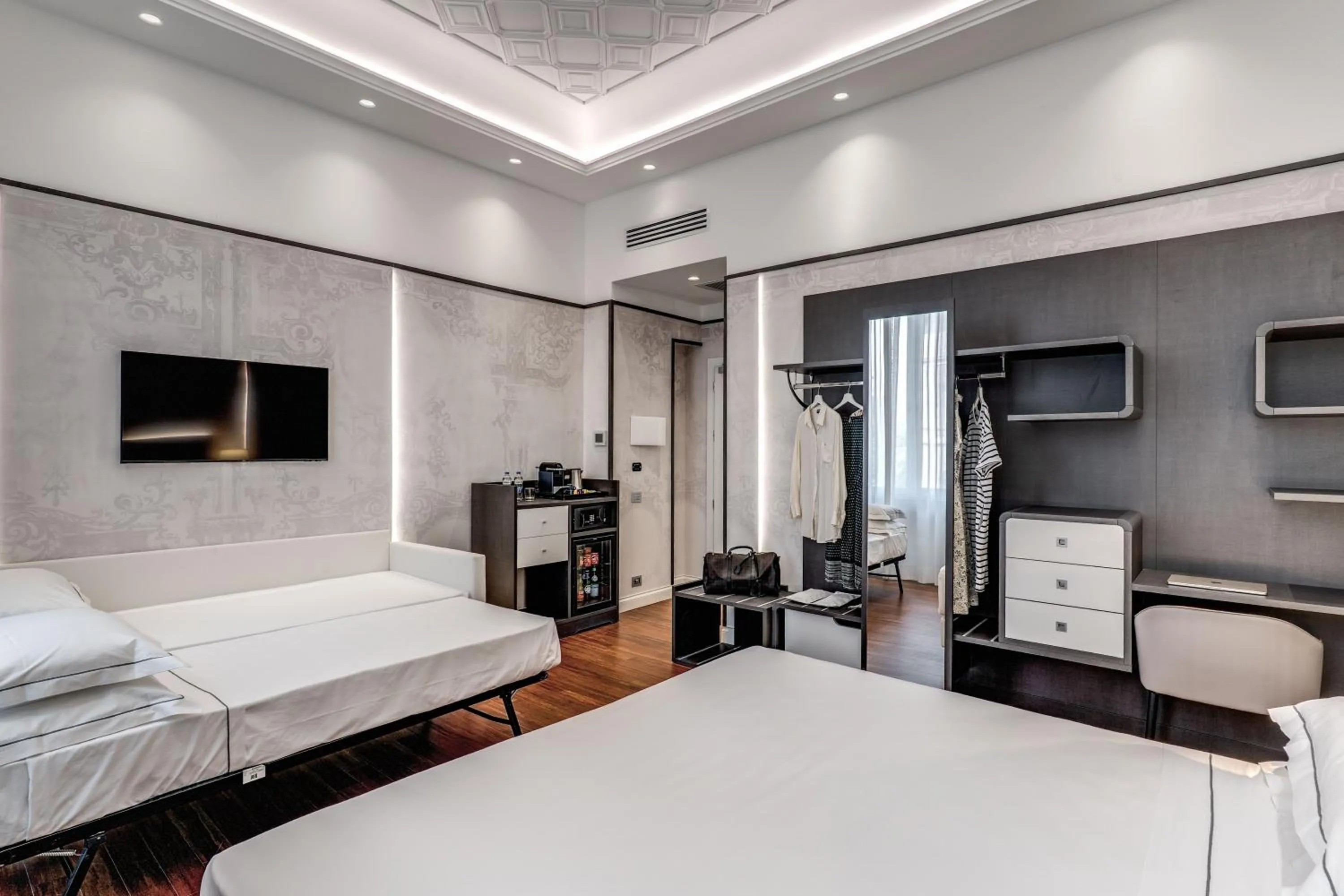 Bed in The Spotlight Boutique Hotel
