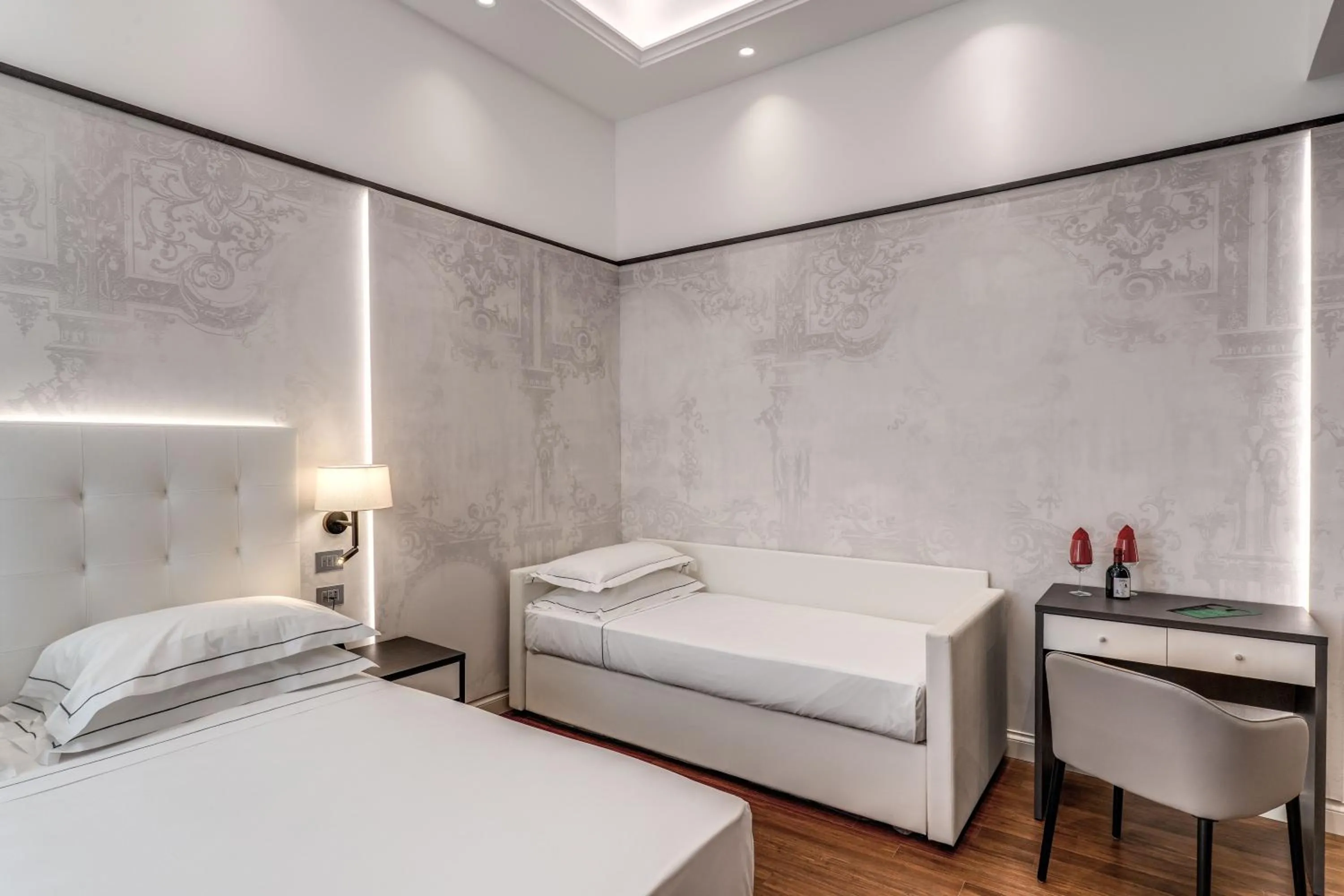 Bed in The Spotlight Boutique Hotel