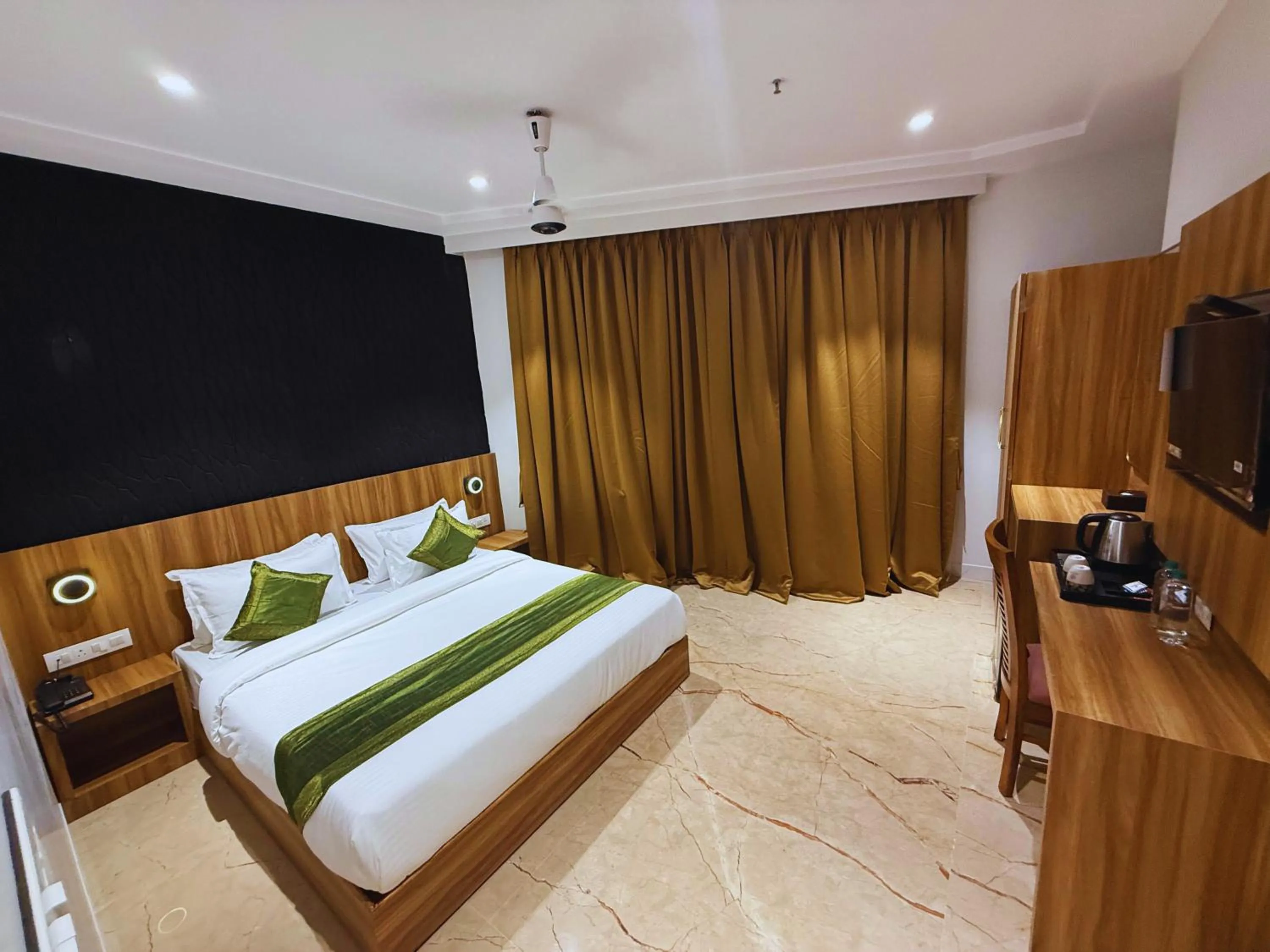 Bed in Hotel Alfa Suites