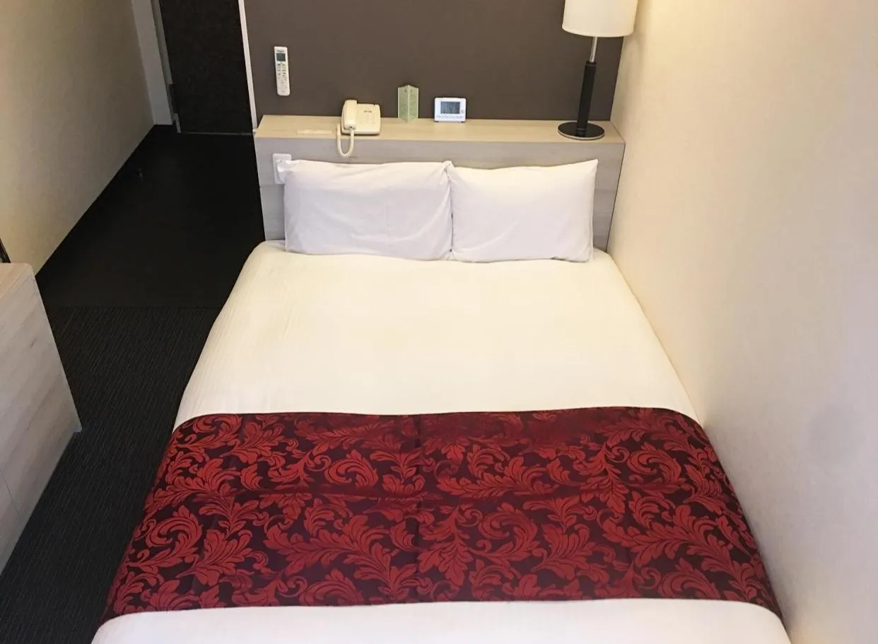 Bed in Hotel Monteroza Ohta
