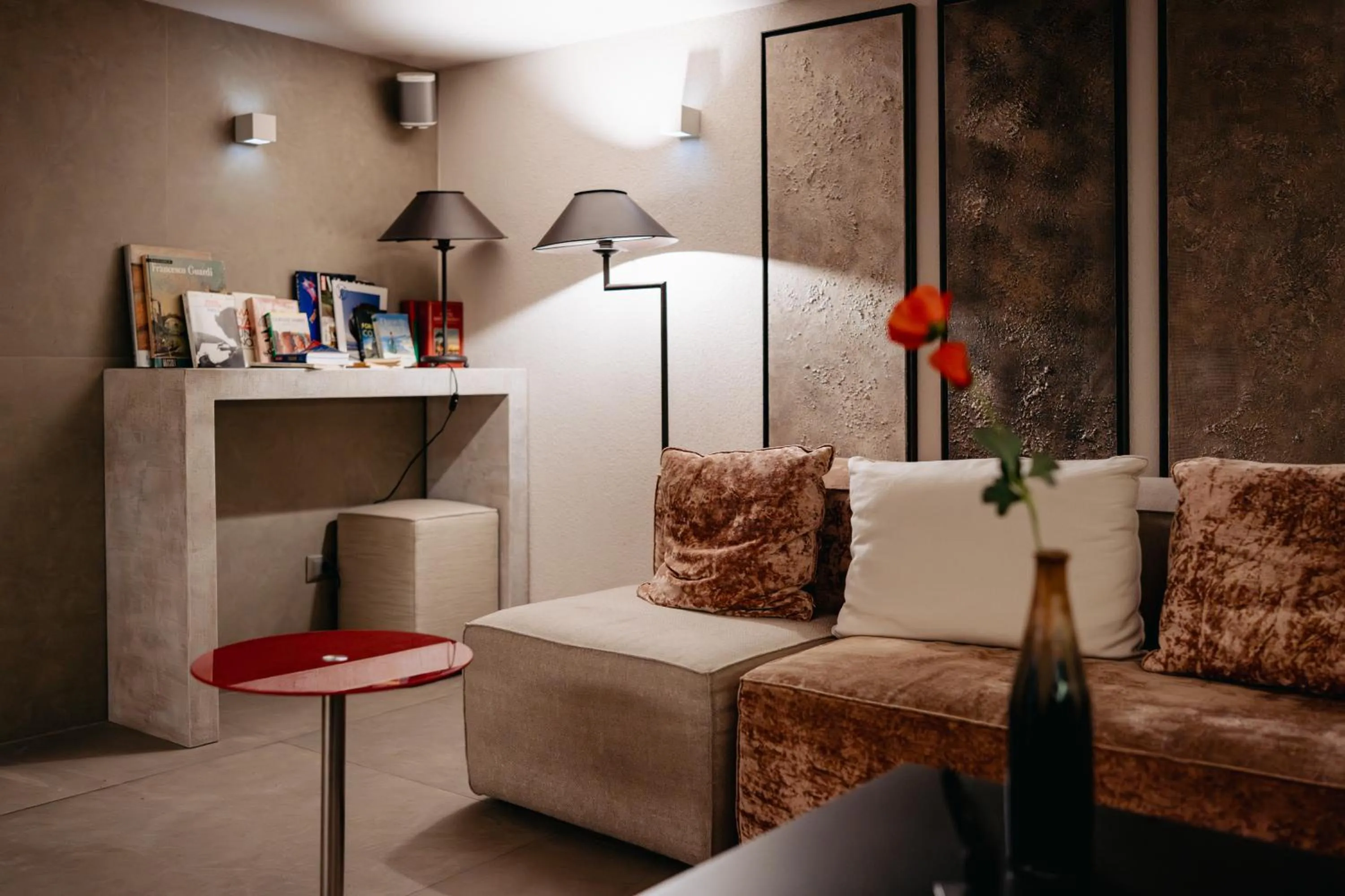 Seating area in Room 230 Roma Luxury Suites