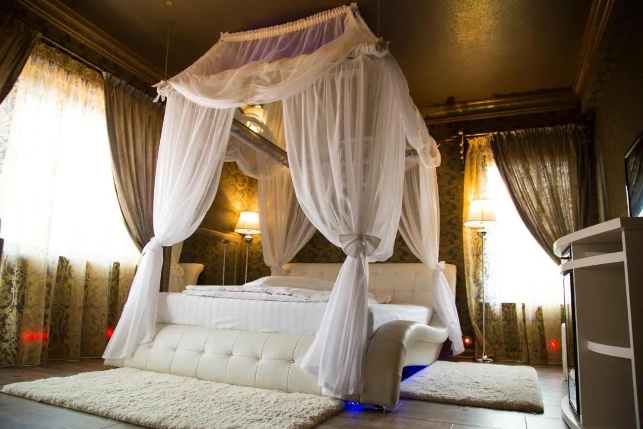 Photo of the whole room, Bed in Hotel Boutique Mikaela (Adult Only)