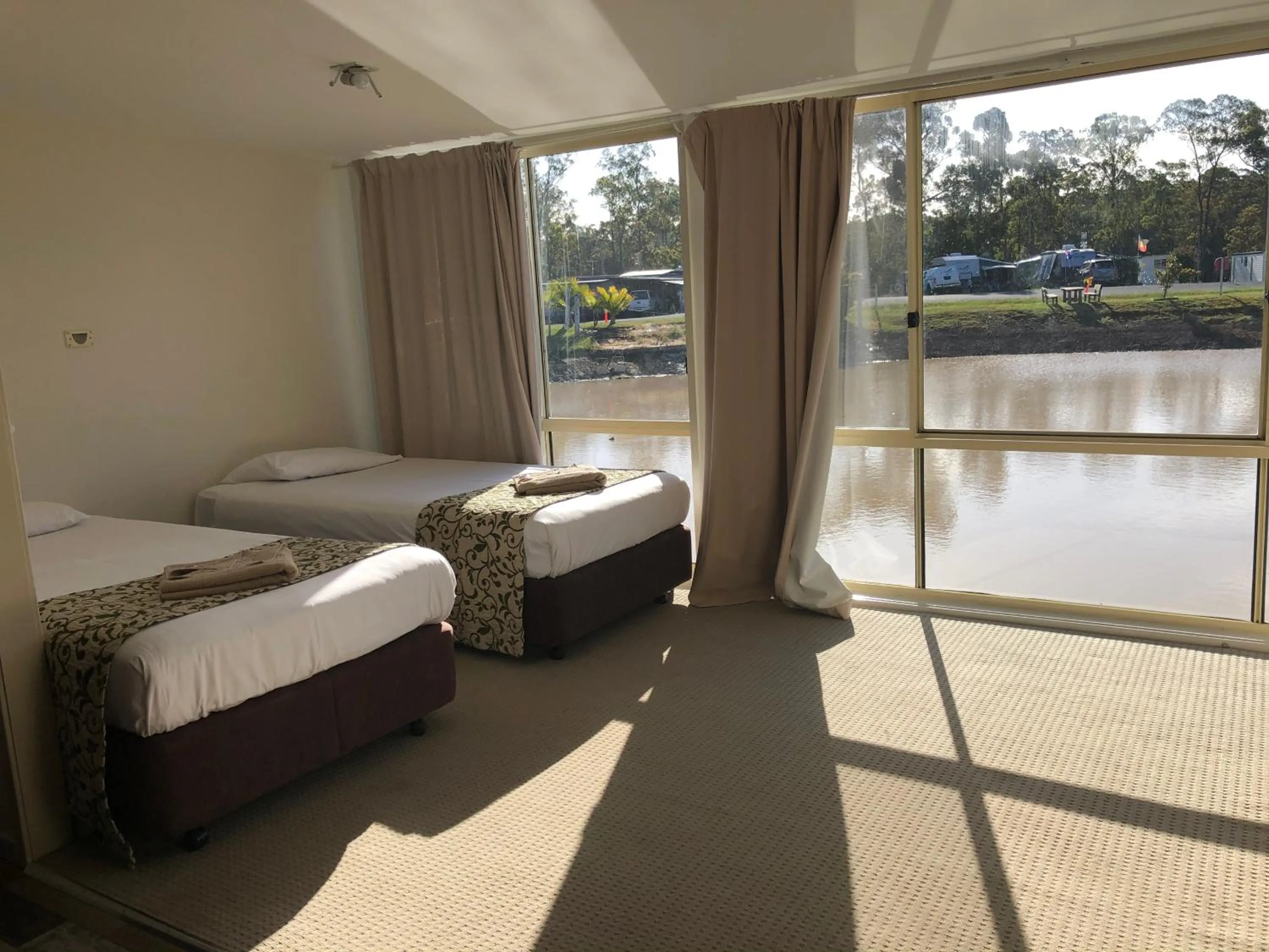 Family, Bed in Australian Motor Home Tourist Park Twelve Mile Creek