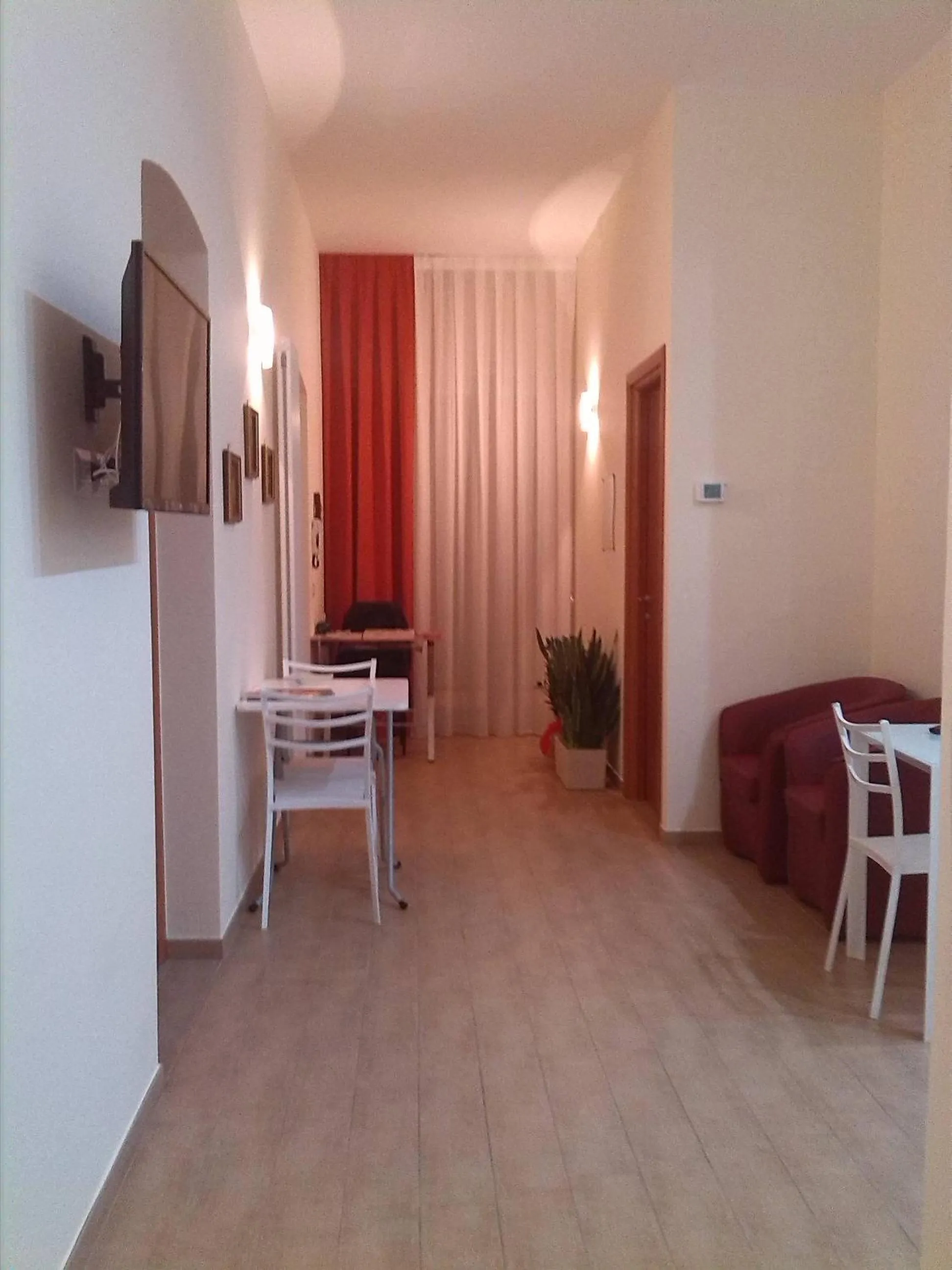 Communal lounge/ TV room in Le Due Nicchie