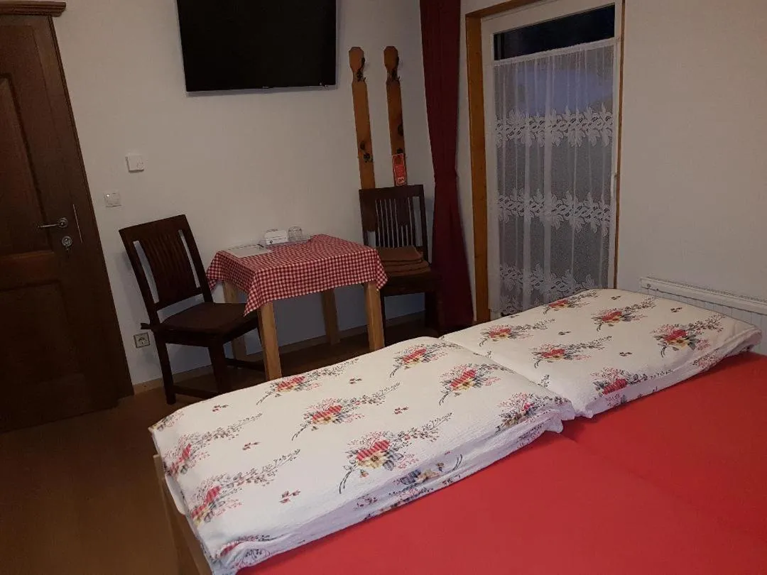 Photo of the whole room, Bed in Pension Haus Rohrmoser