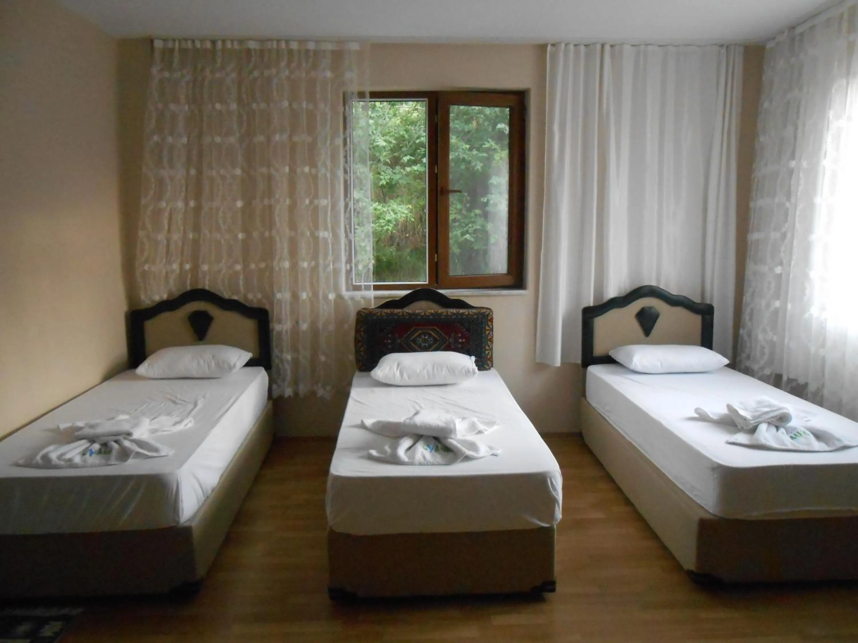 Bed in Taurus Guest House