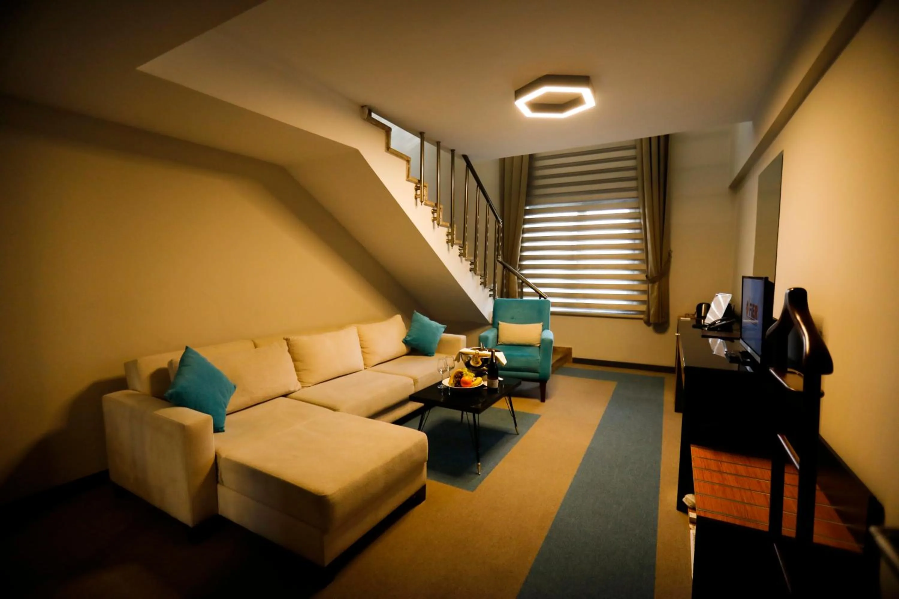 Communal lounge/ TV room in Fier Life Center