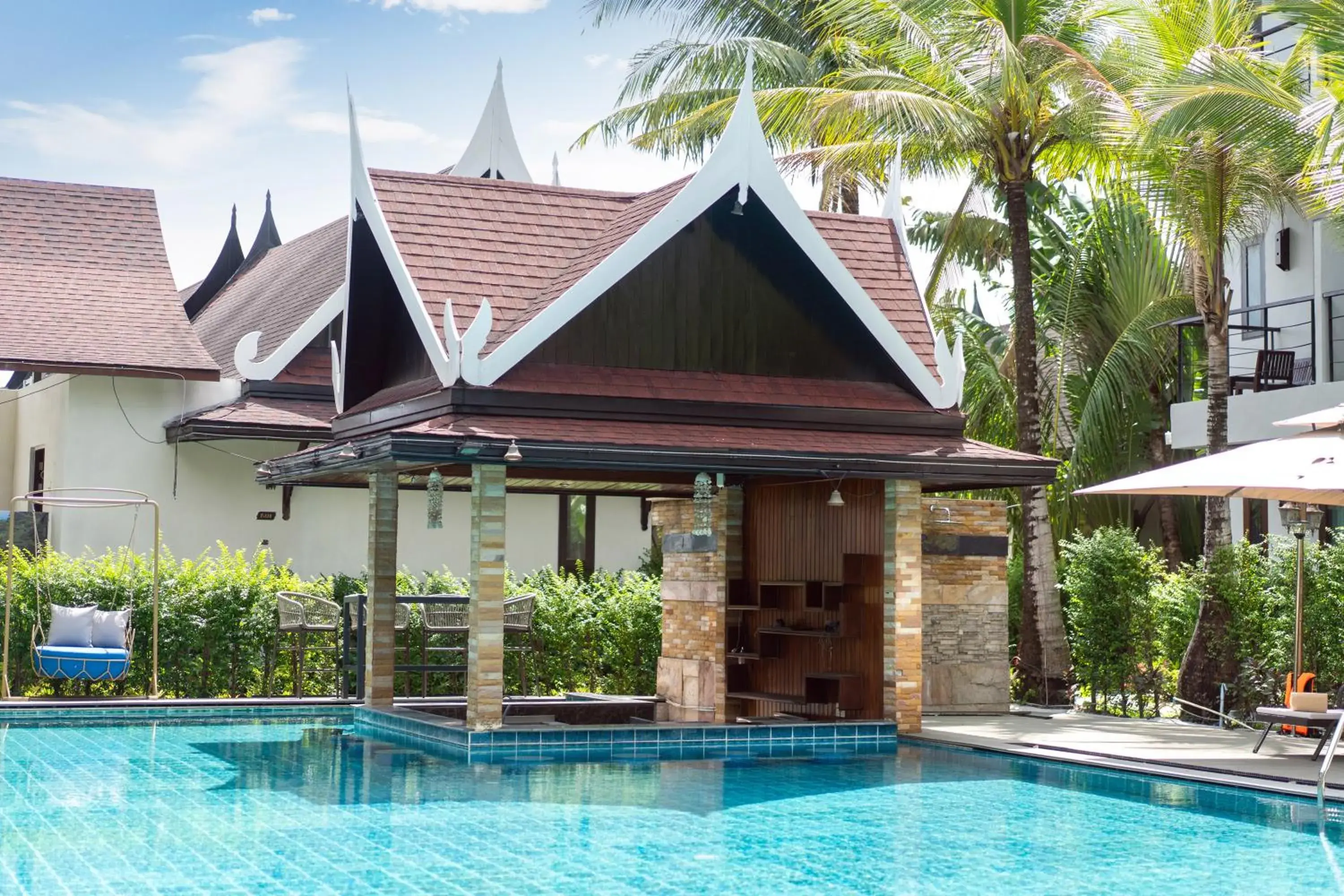 Swimming pool in Howard Johnson by Wyndham Phuket Naiyang Swimming pool in Howard Johnson by Wyndham Phuket Naiyang