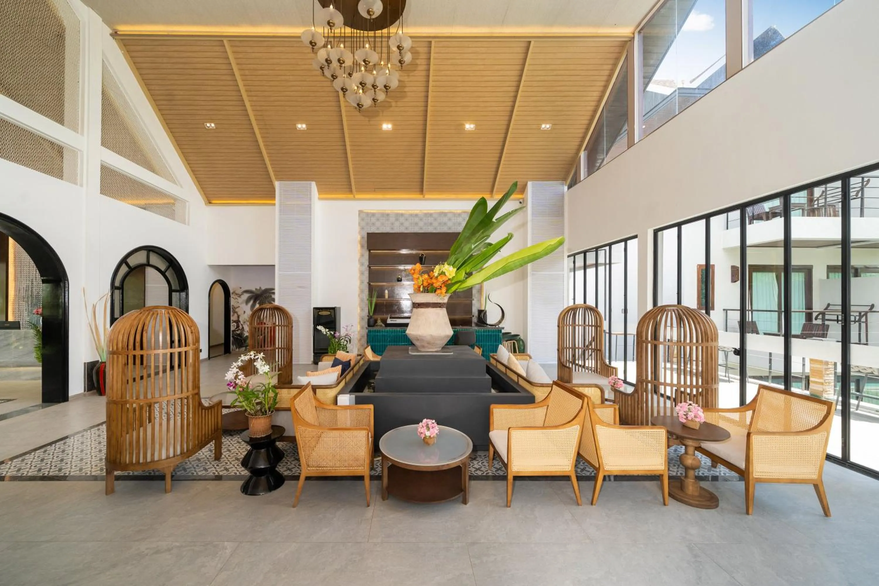 Communal lounge/ TV room in Howard Johnson by Wyndham Phuket Naiyang