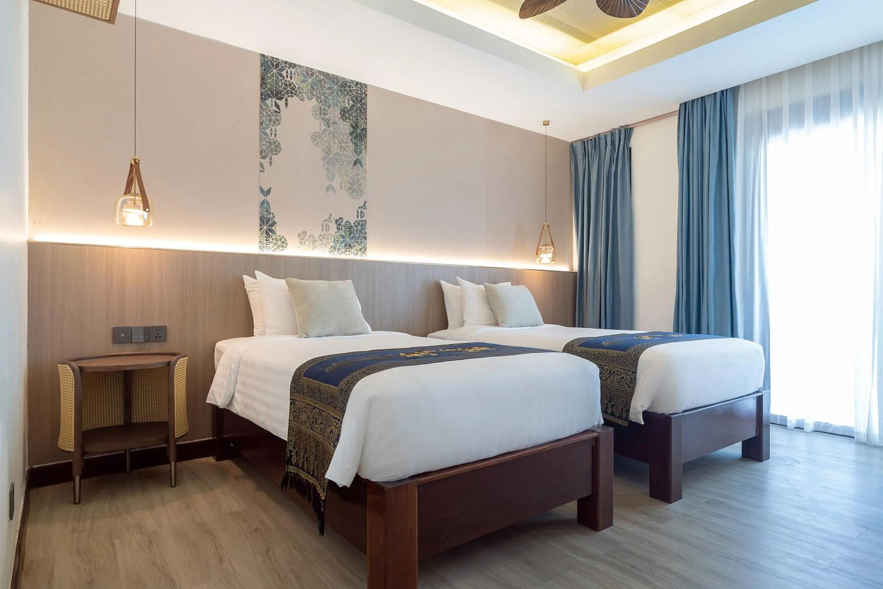 Bed in Howard Johnson by Wyndham Phuket Naiyang