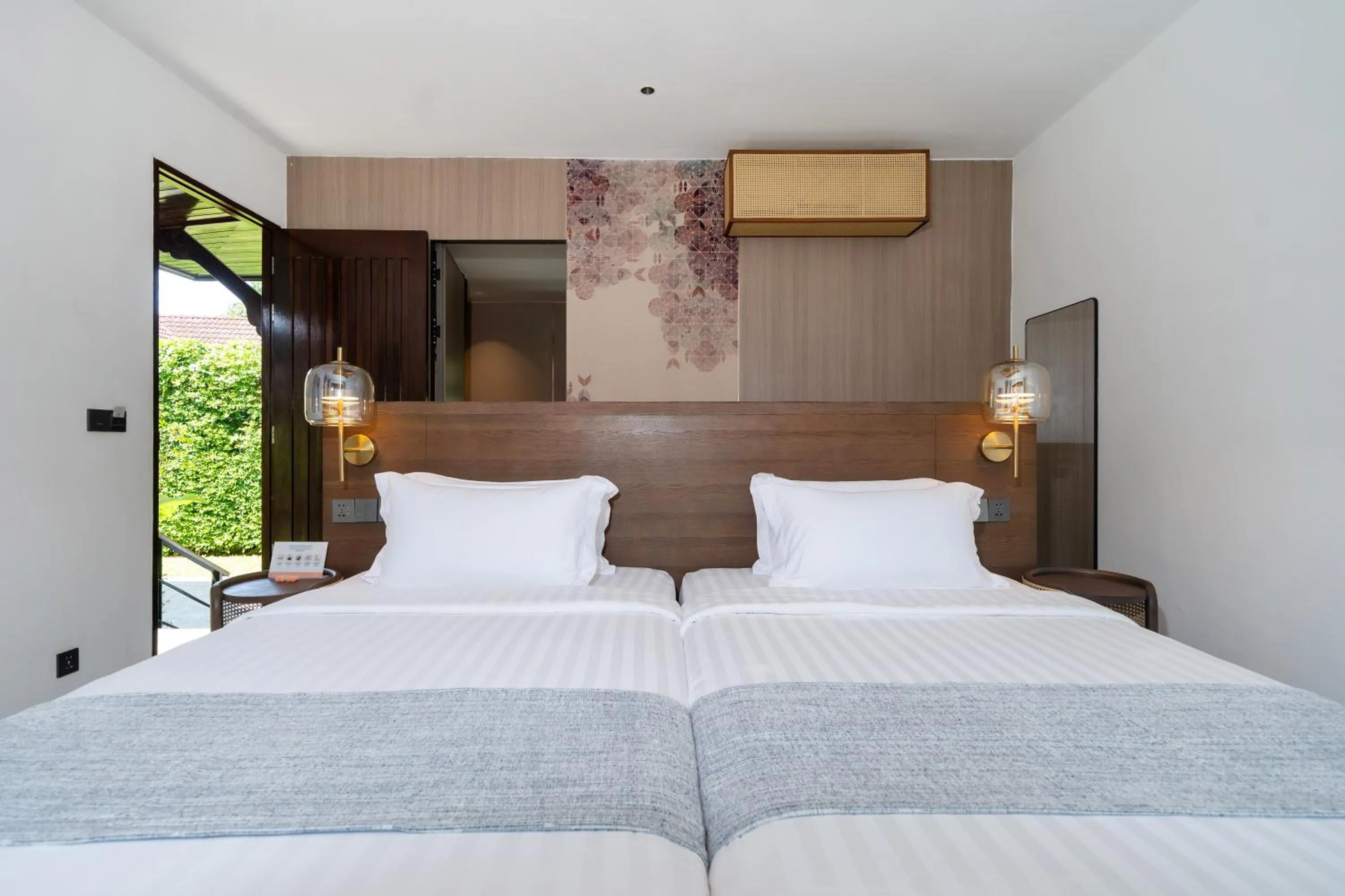 Bed in Howard Johnson by Wyndham Phuket Naiyang