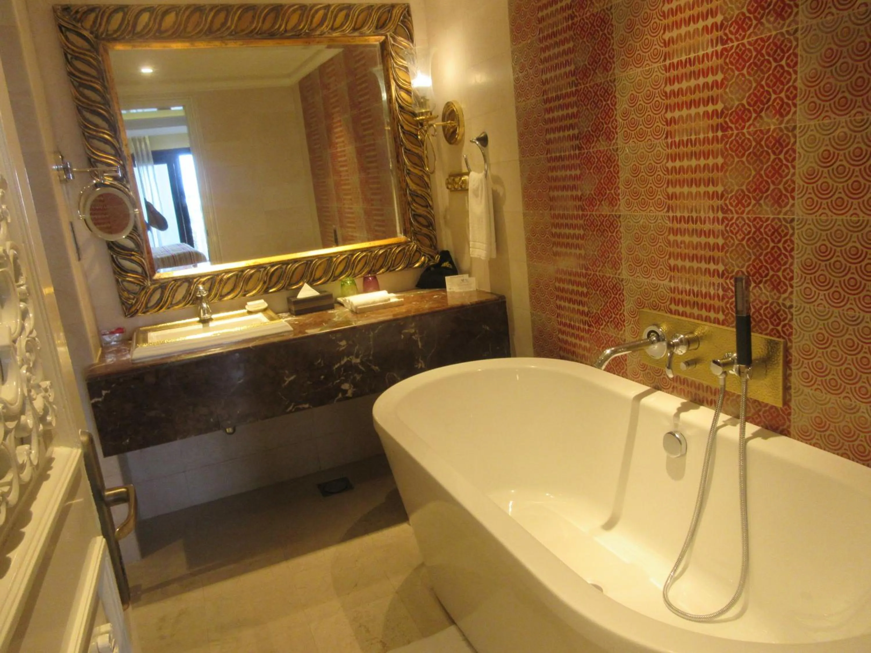 Bathroom in Fragrant Nature Kochi - A Five star Classified Hotel