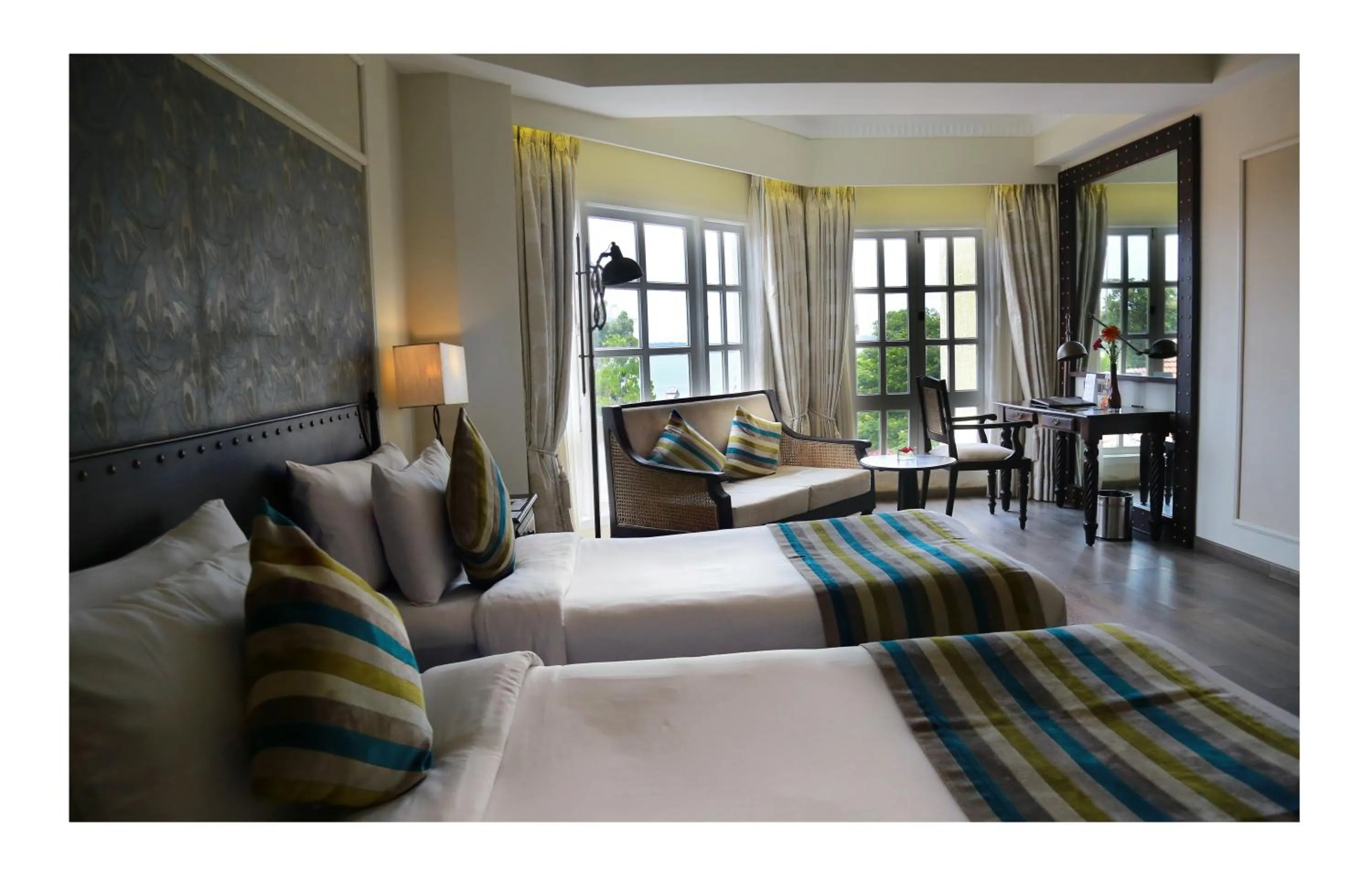 Bed in Fragrant Nature Kochi - A Five star Classified Hotel