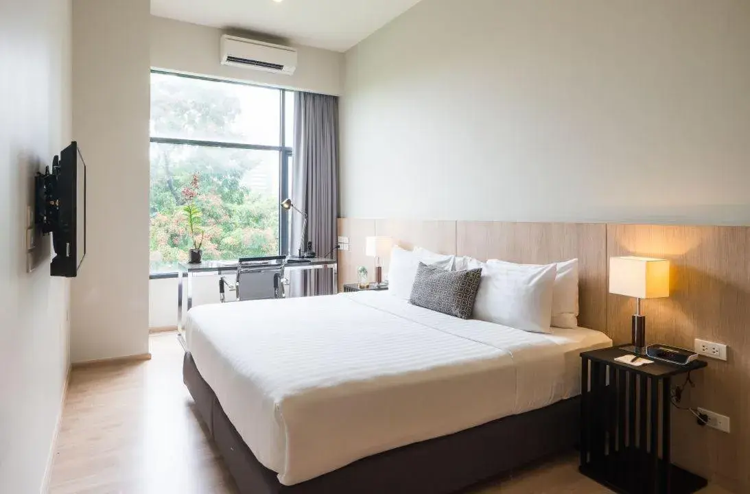 Seating area, Bed in The Residence on Thonglor by UHG Seating area, Bed in The Residence on Thonglor by UHG