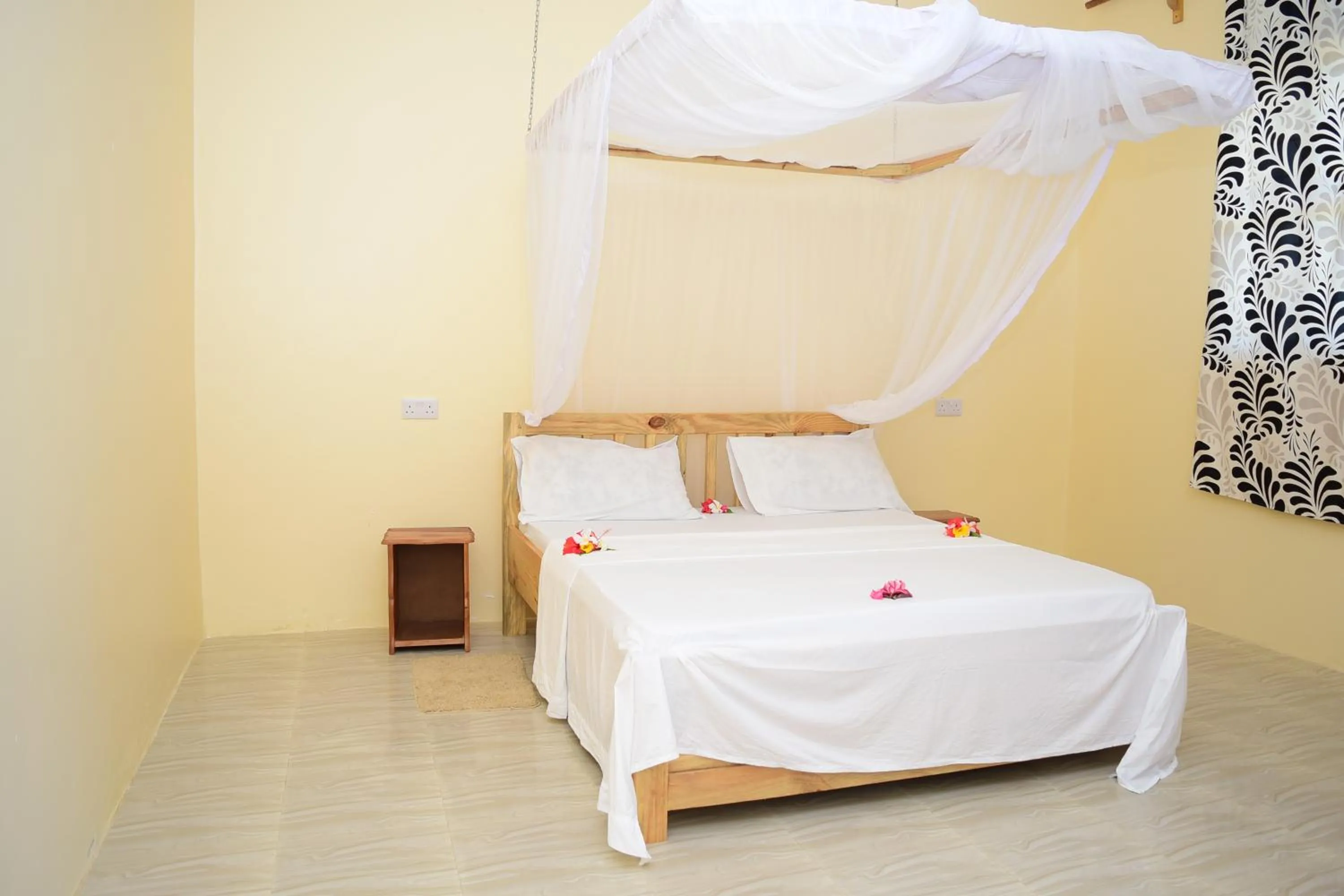 Bed in Kigwedeni Villas