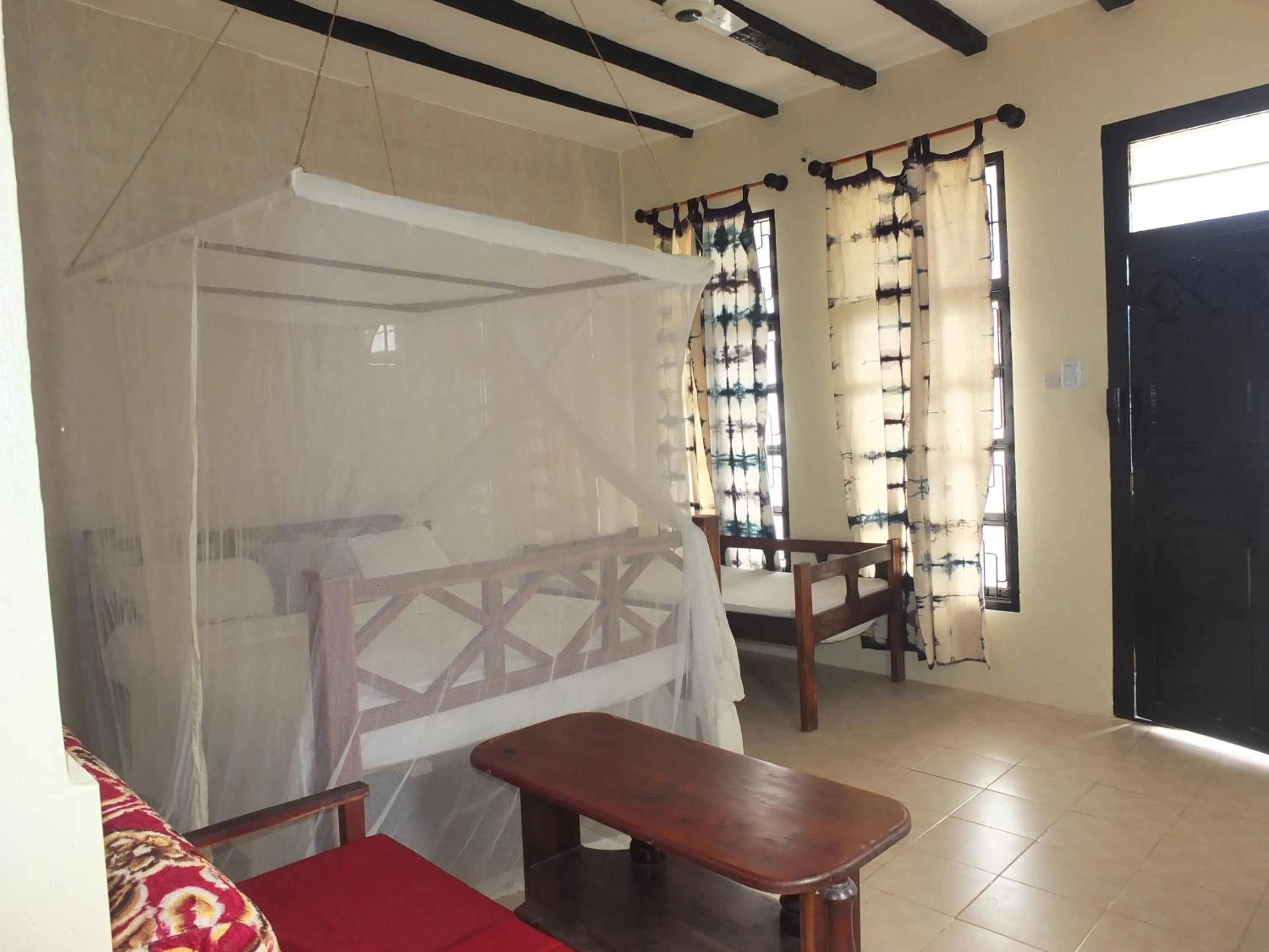 Bed in Kigwedeni Villas