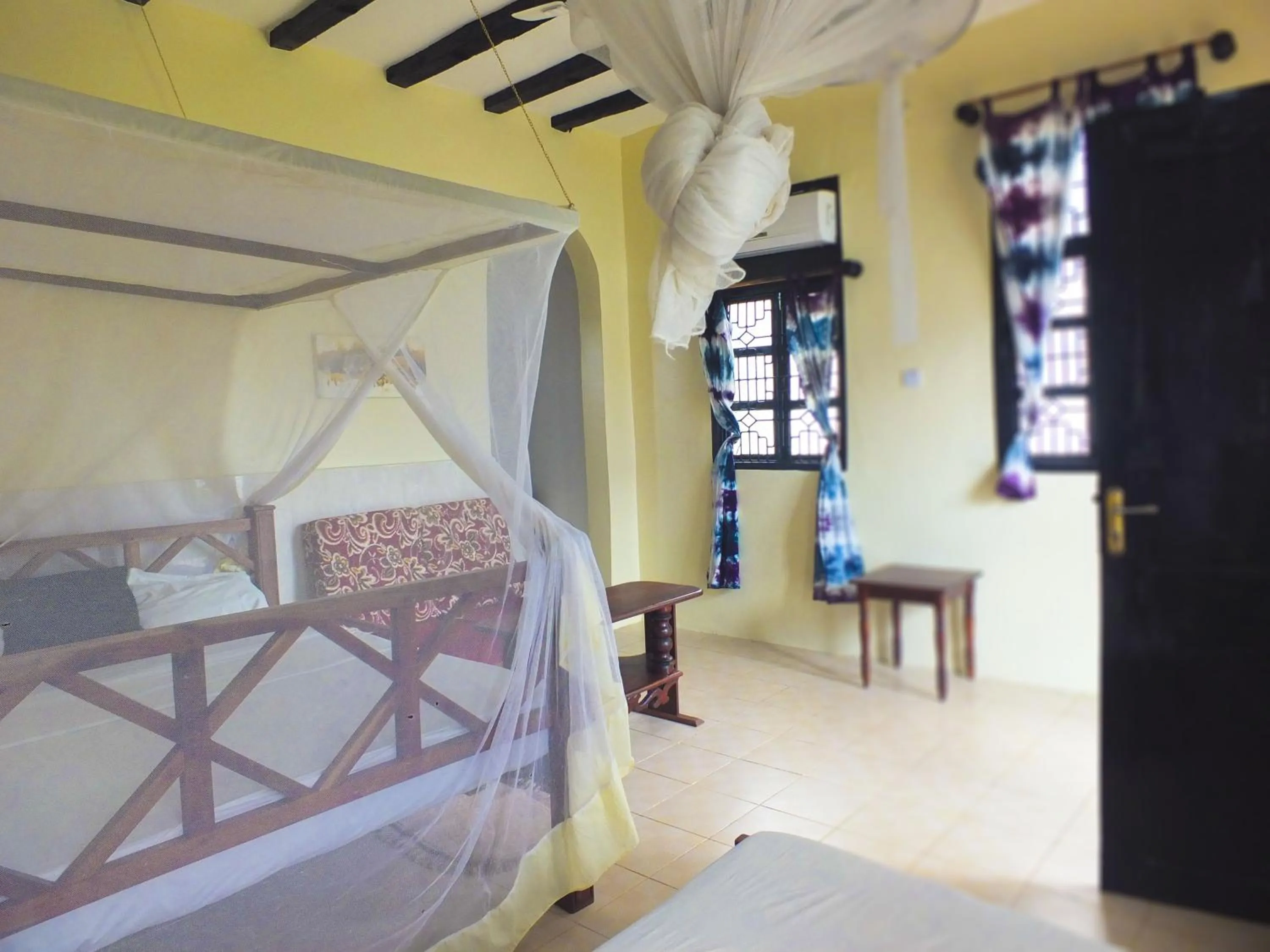 Bed in Kigwedeni Villas