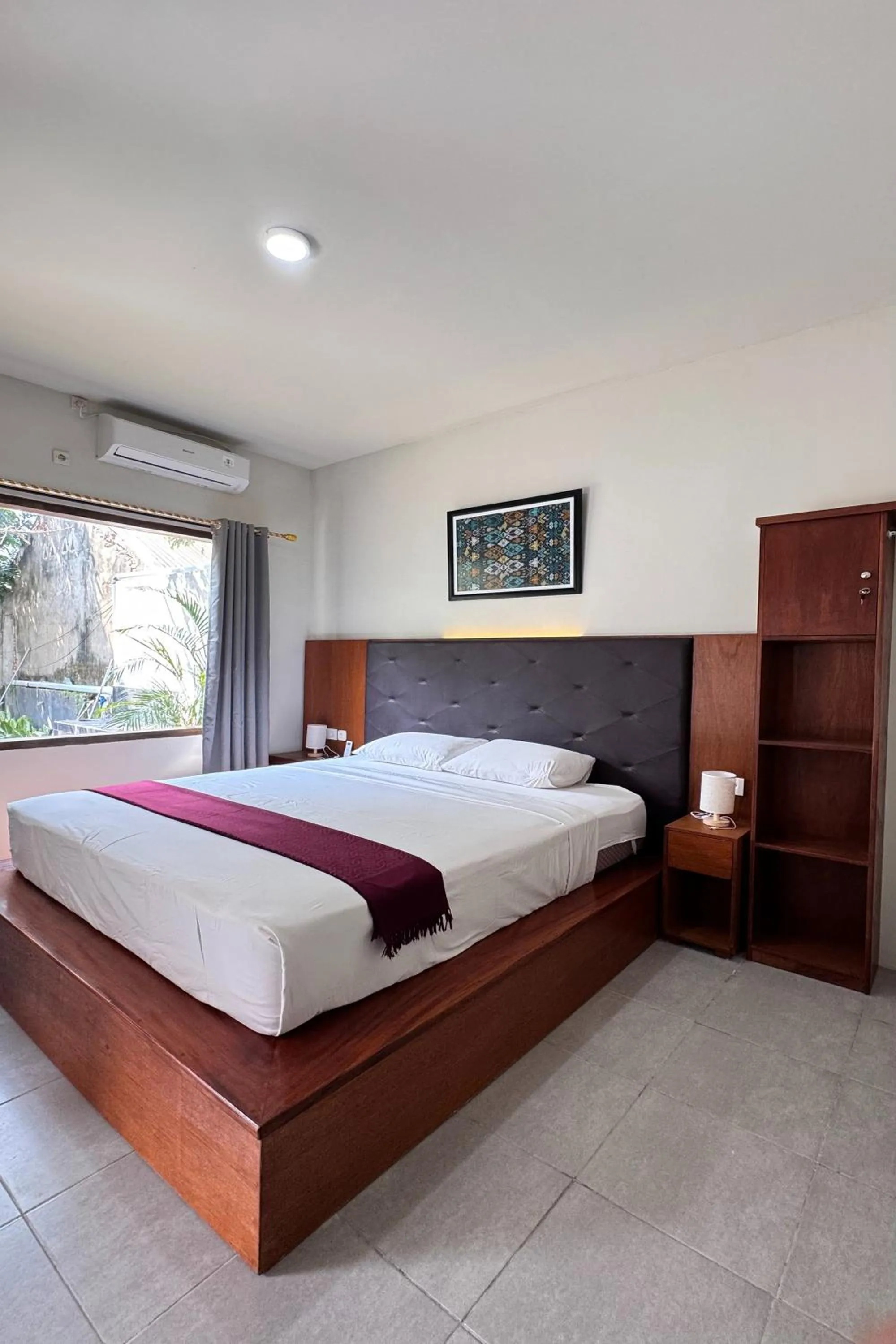 Bed in Senggigi Cottages Lombok