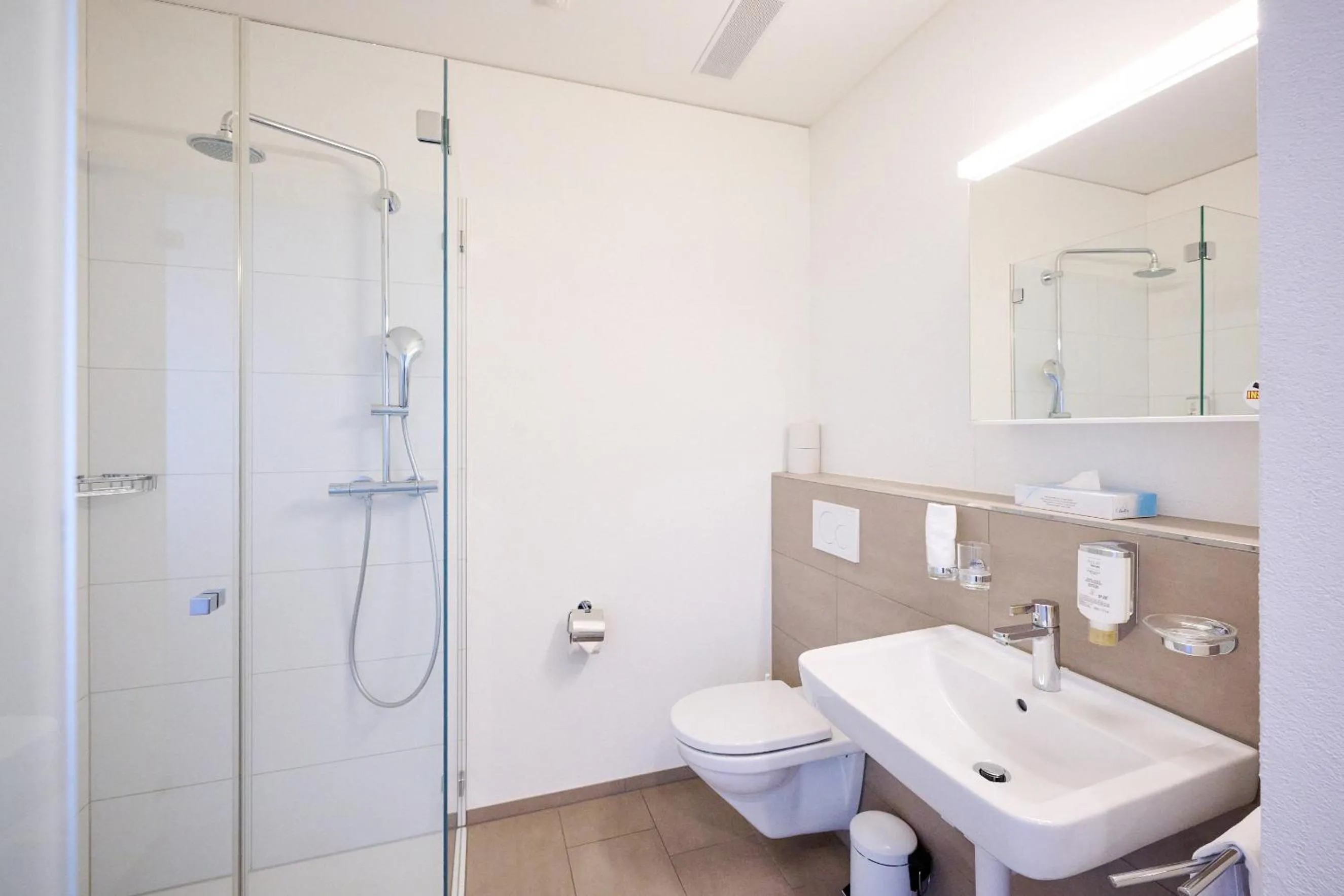 Bathroom in Smart Hotel Kreisel --Self check-In