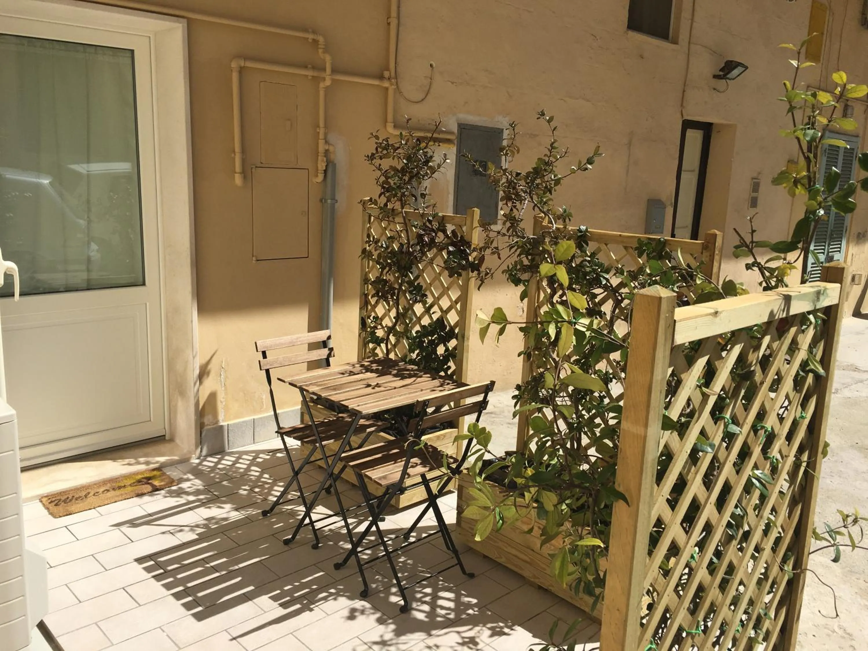 Patio in Hydria Rooms