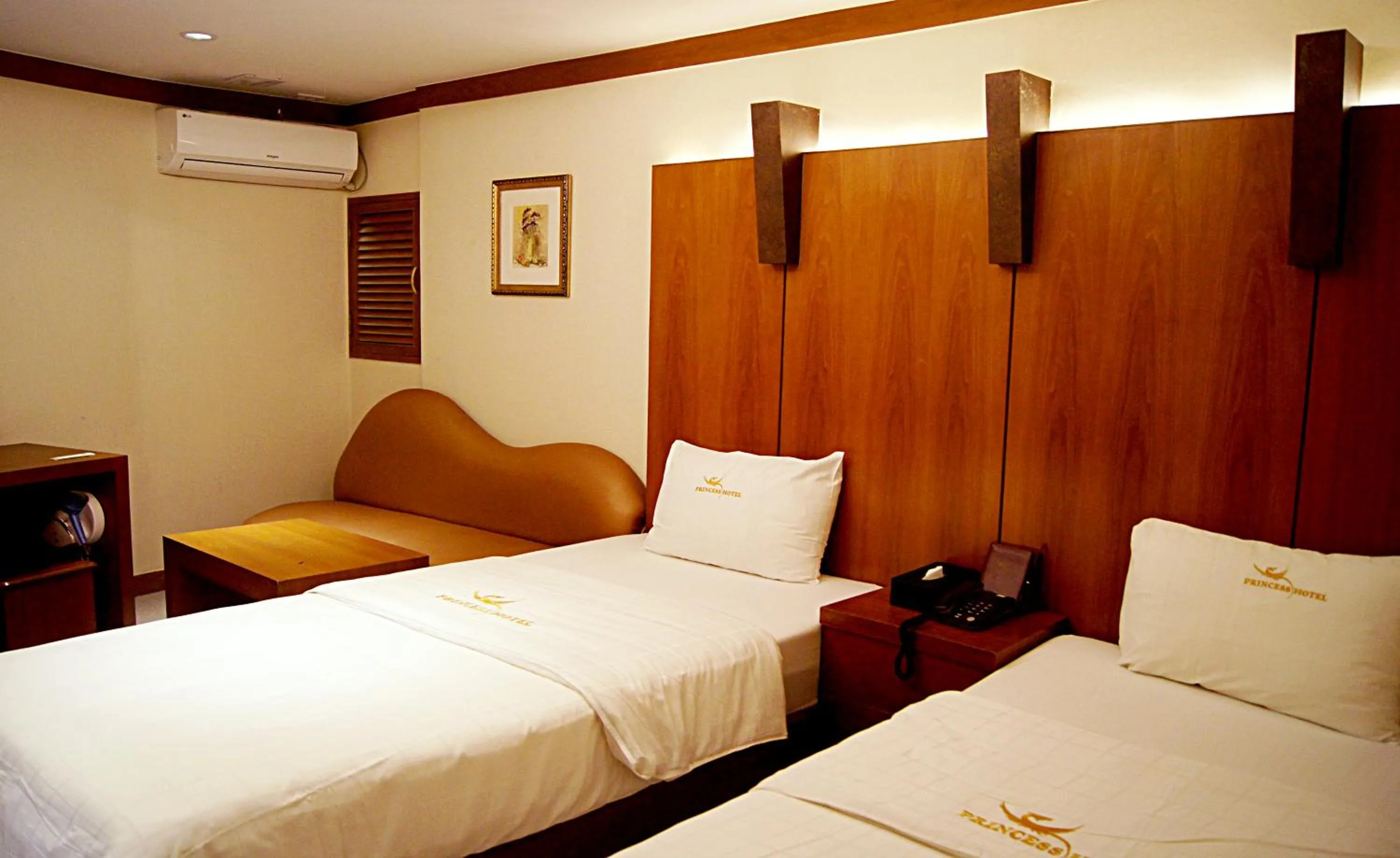 Bed in Princess Hotel