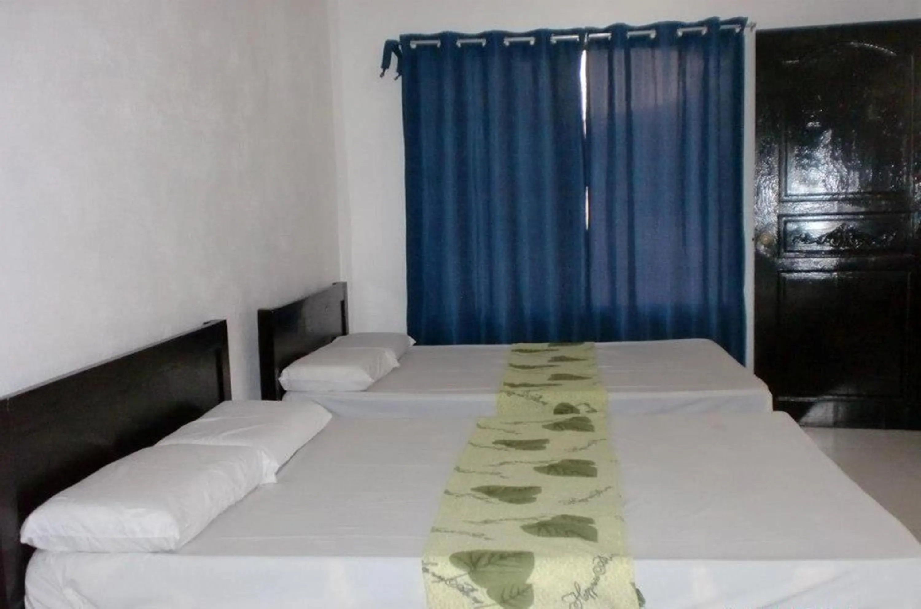 Bed in Pabua's Cottages