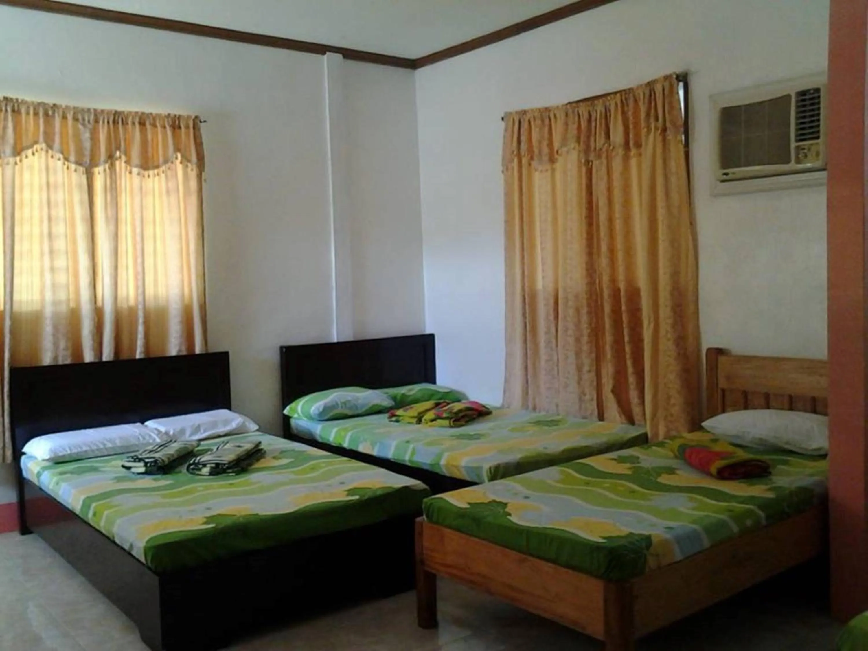 Bed in Pabua's Cottages