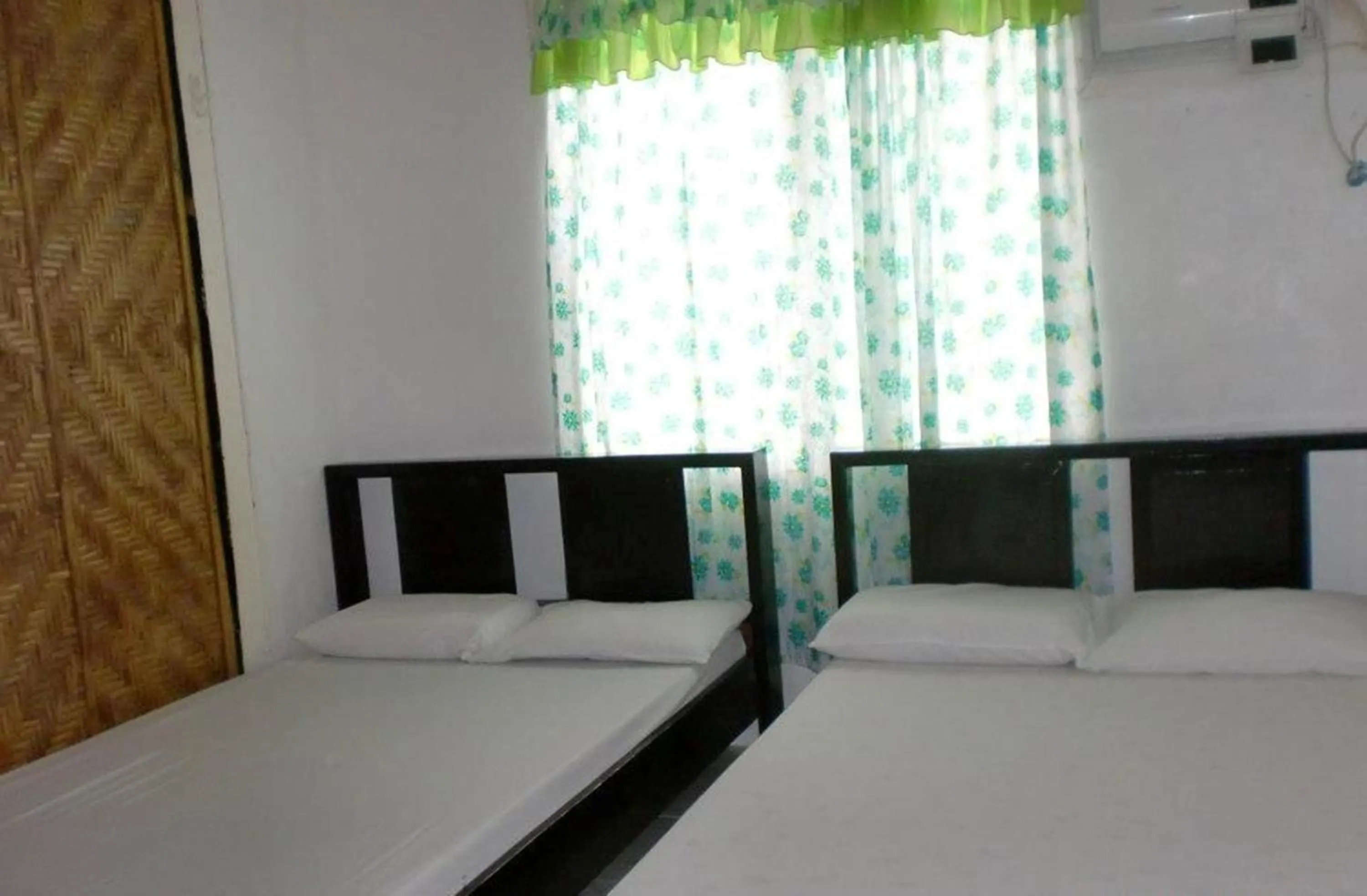 Bed in Pabua's Cottages