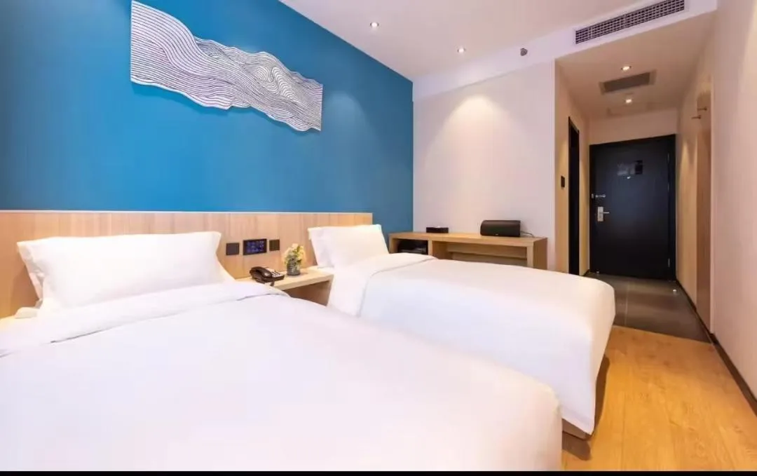 Bed in Orange Hotel Beijing Guangming Bridge