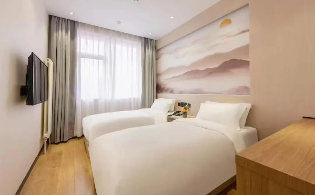 Bed in Orange Hotel Beijing Guangming Bridge