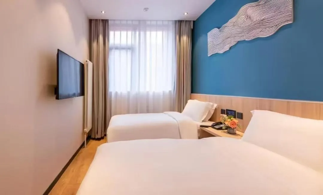 Bed in Orange Hotel Beijing Guangming Bridge