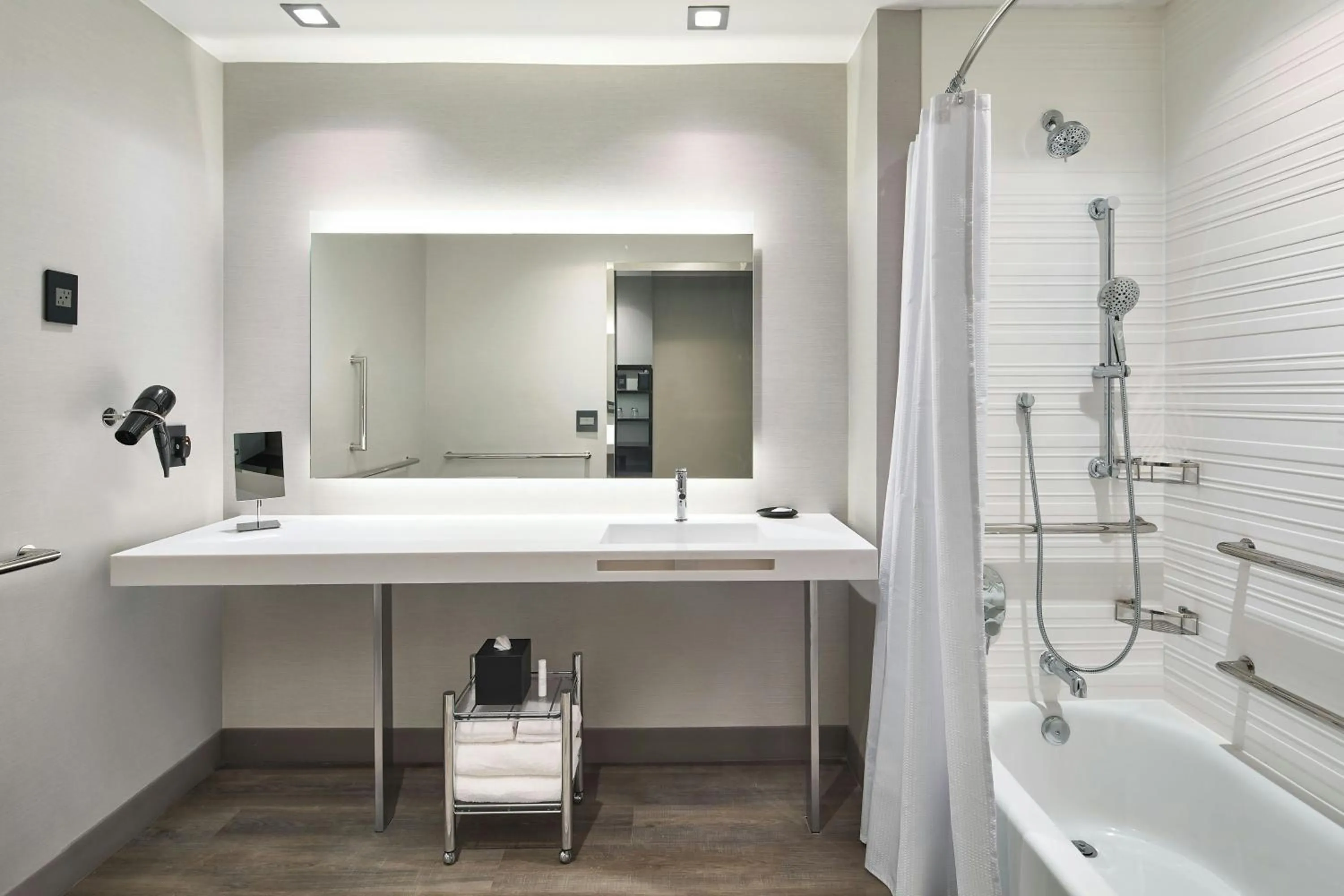 Bathroom in AC Hotel by Marriott Auburn