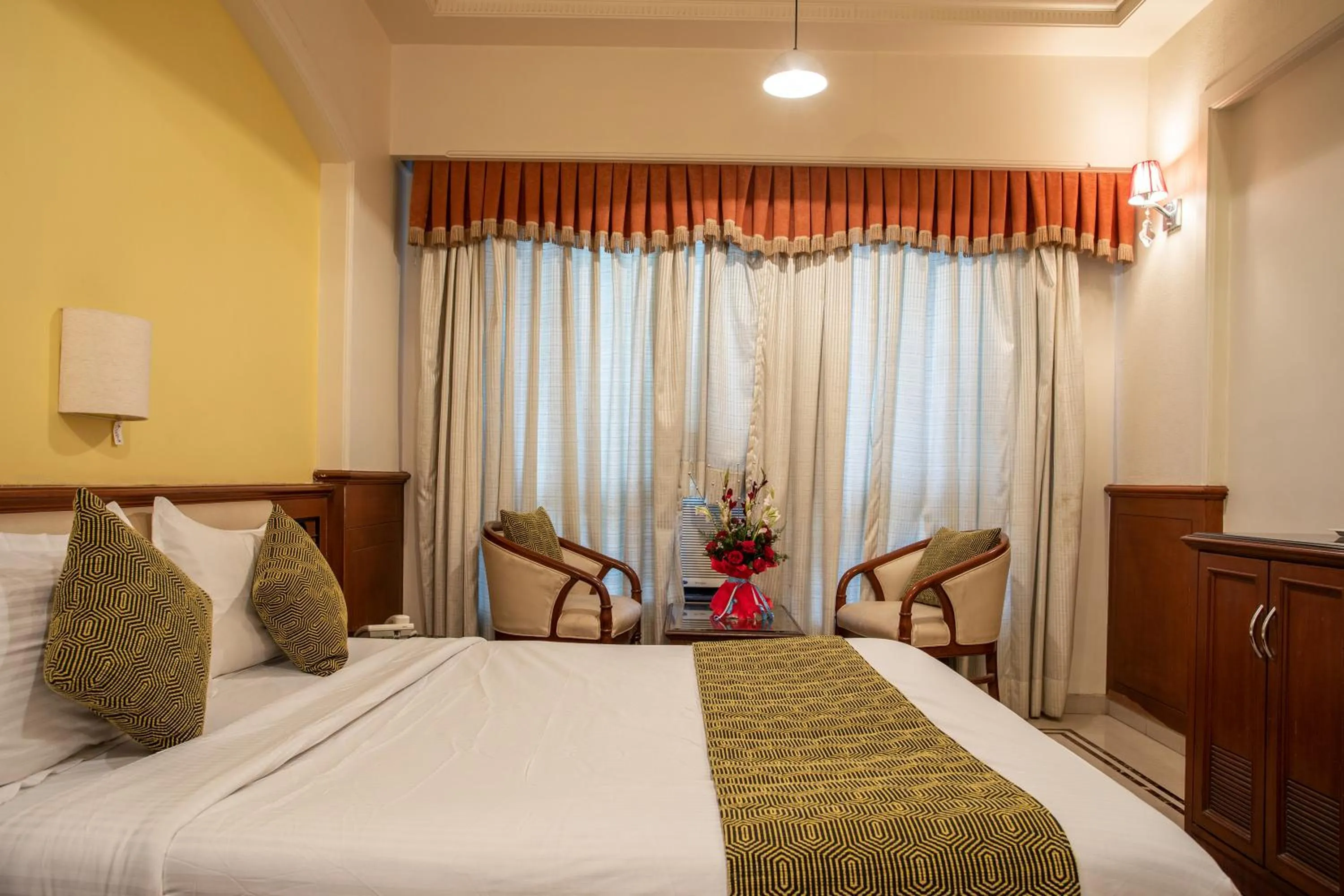 Bed in Hotel Dwaraka Residency