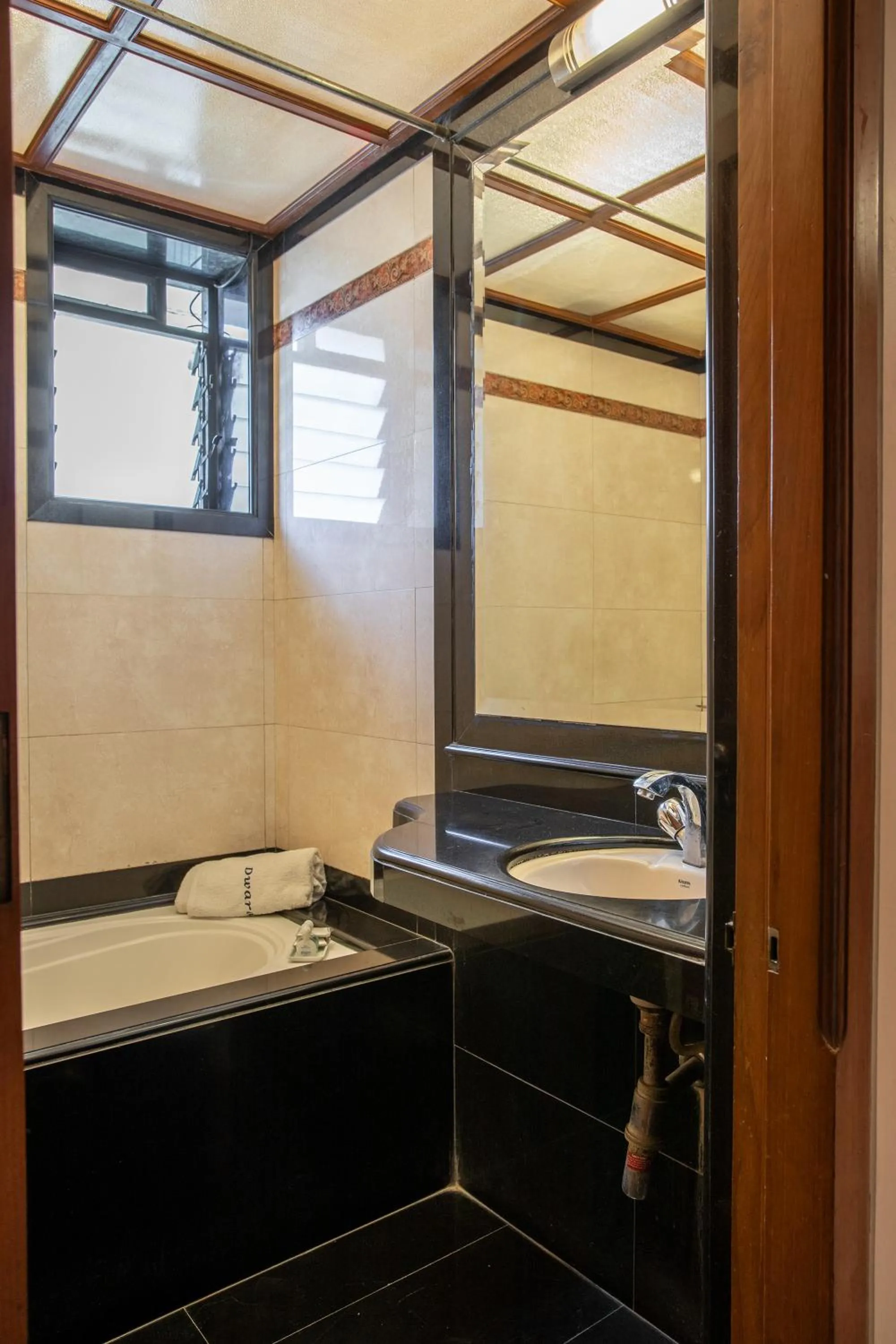 Bathroom in Hotel Dwaraka Residency